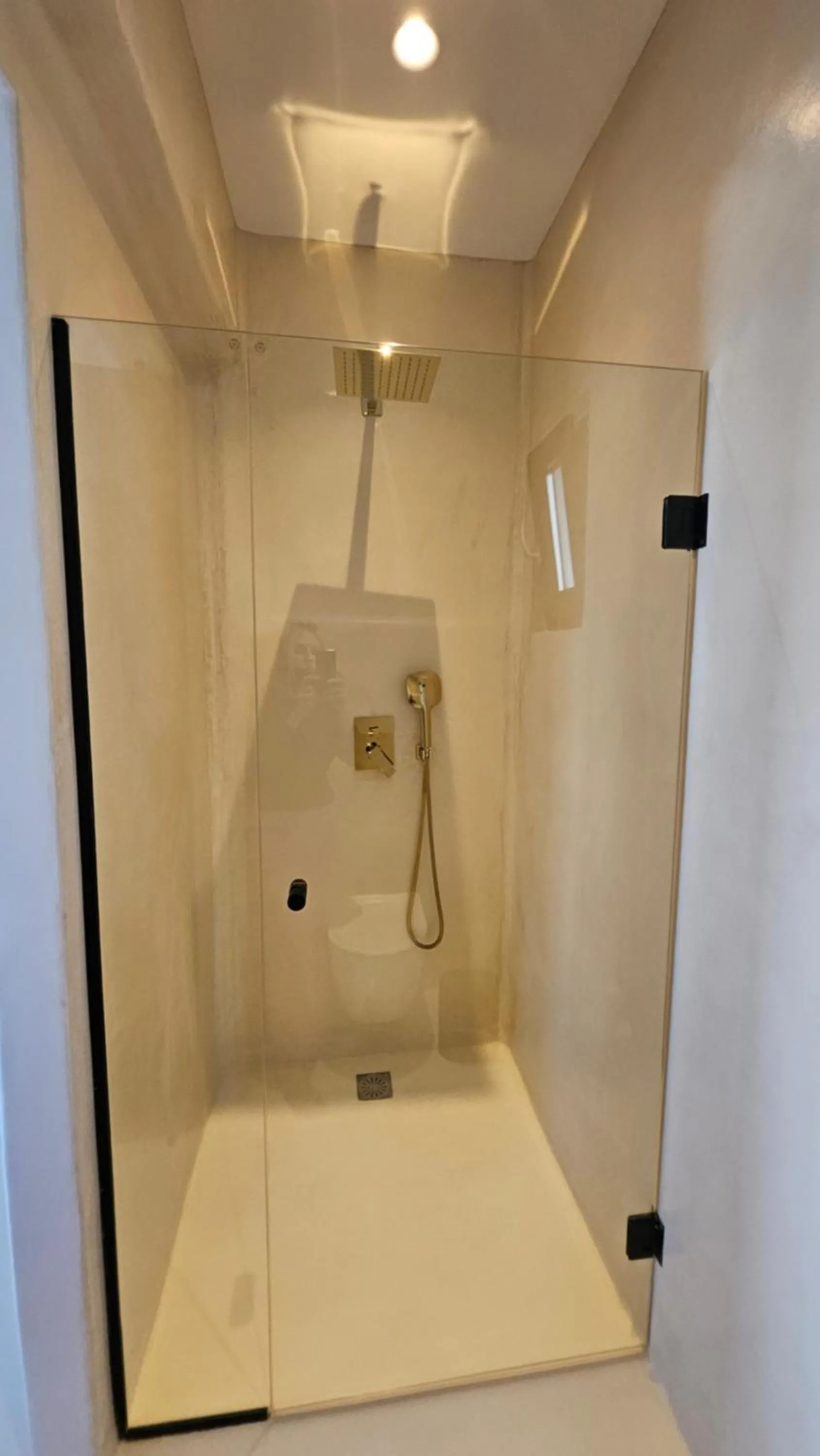 Shower in ELLI TROPiCAL LUXURY SUITES SUNSET-INFINITY POOL- SEA SIDE-NEAR CENTER PARKING