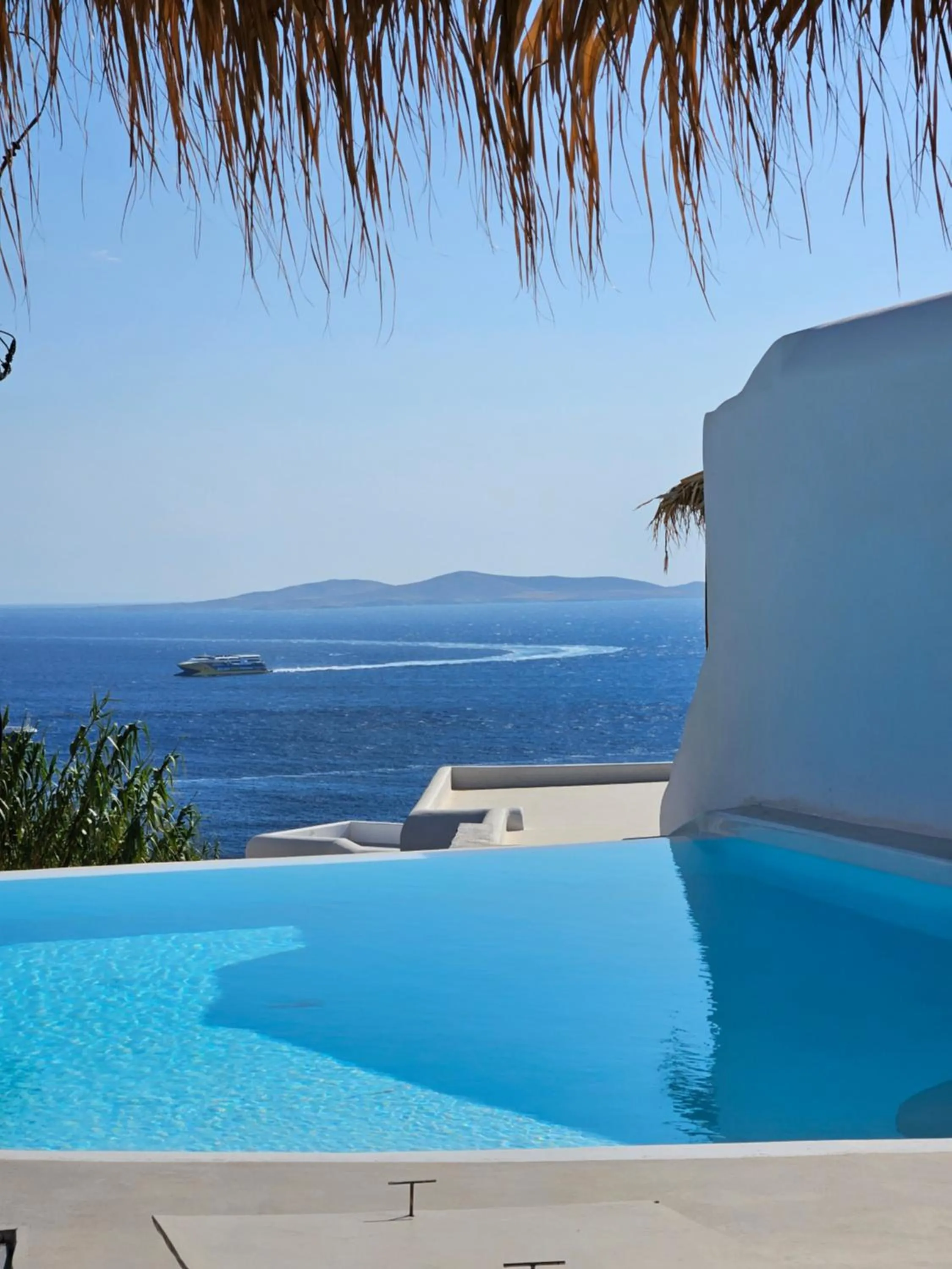 Swimming pool in ELLI TROPiCAL LUXURY SUITES SUNSET-INFINITY POOL- SEA SIDE-NEAR CENTER PARKING
