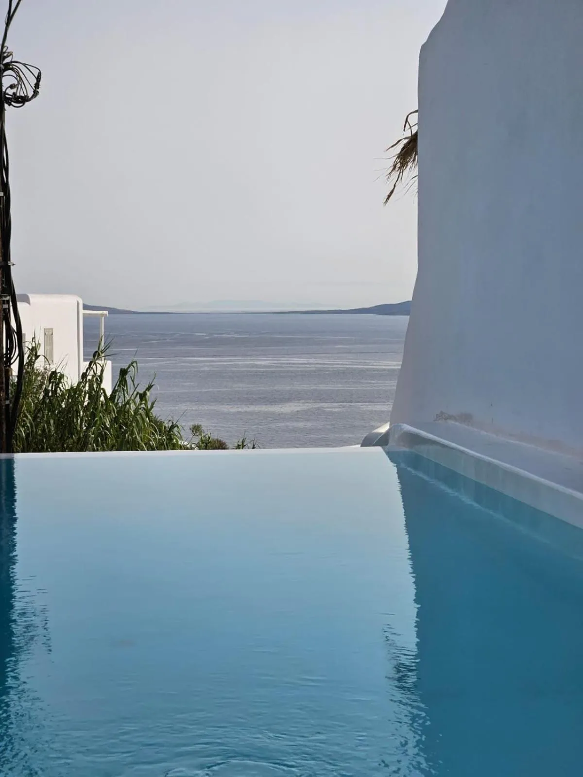 Pool view in ELLI TROPiCAL LUXURY SUITES SUNSET-INFINITY POOL- SEA SIDE-NEAR CENTER PARKING