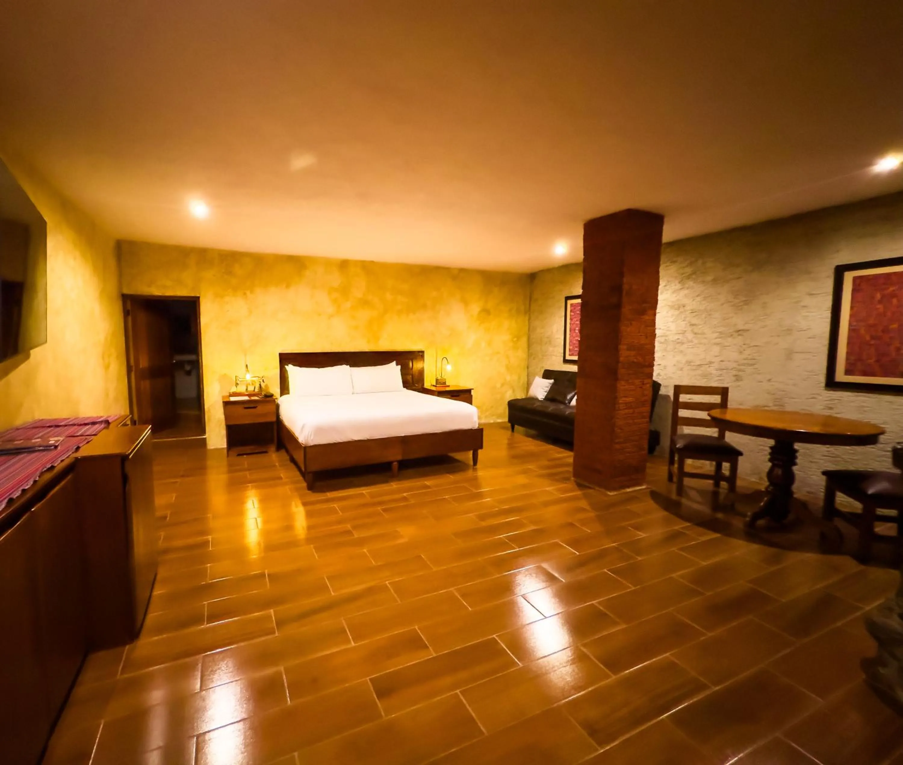 Living room, Bed in Le Suisse Spa