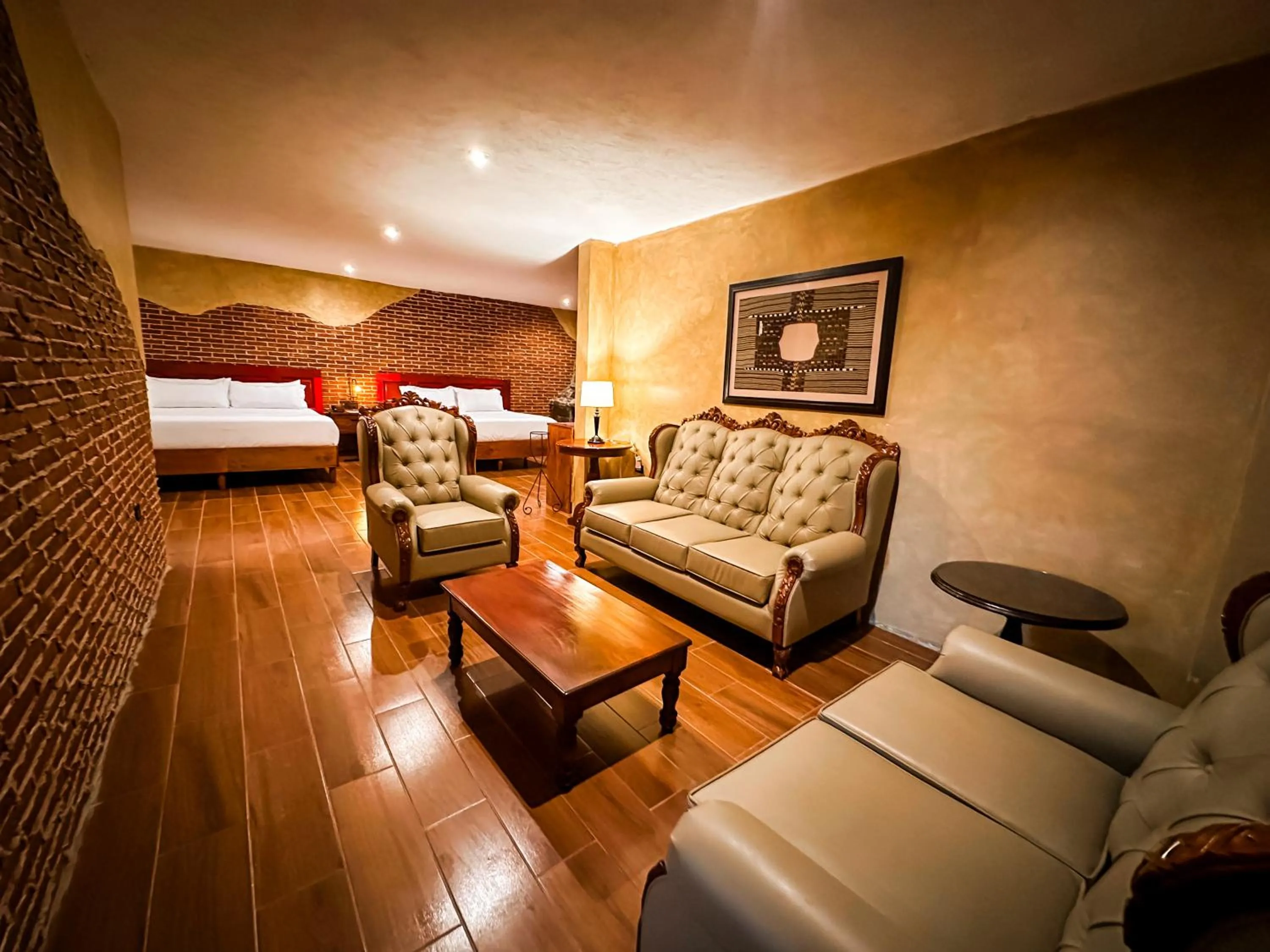 Living room, Bed in Le Suisse Spa
