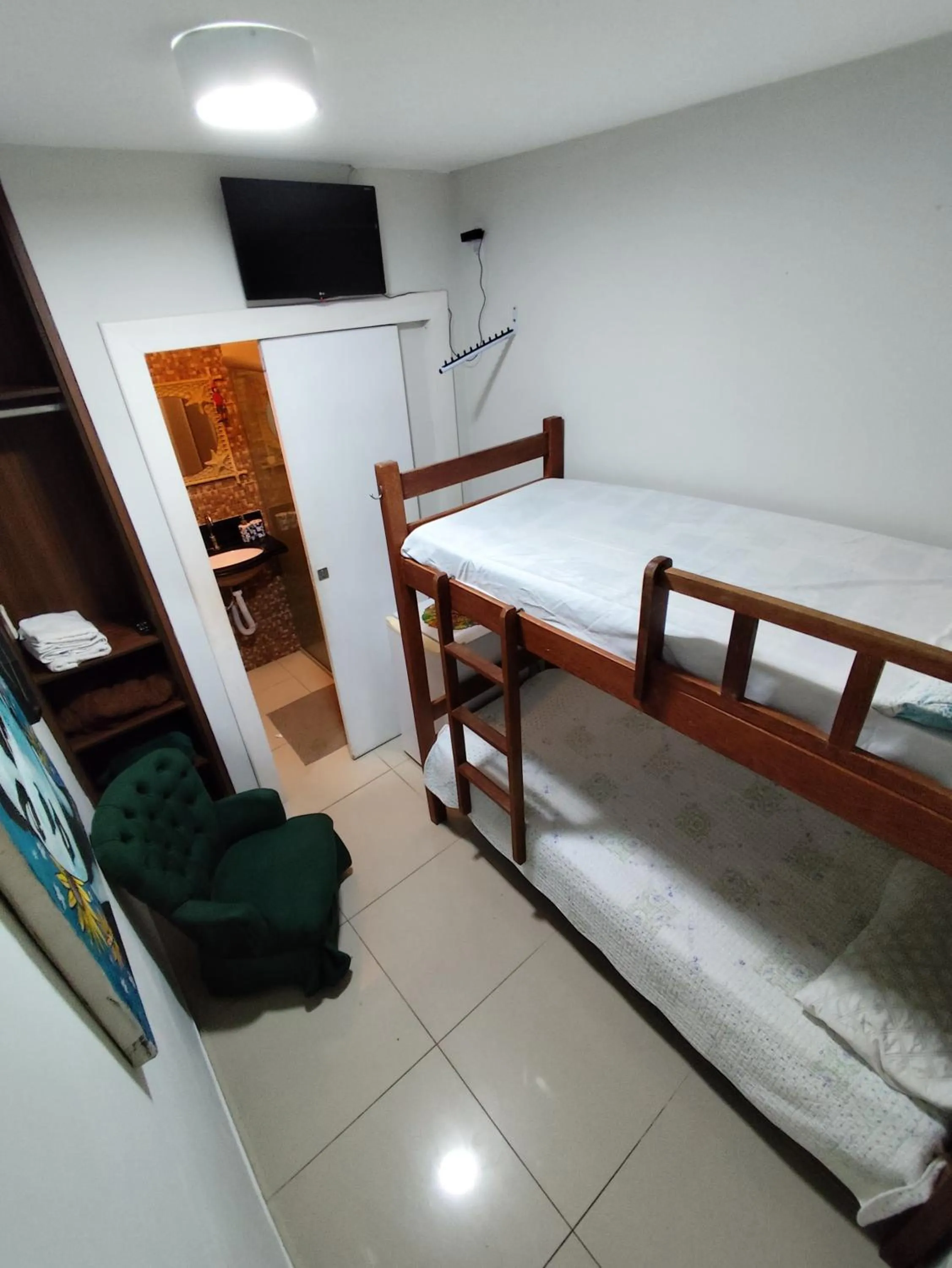 Communal lounge/ TV room, Bed in Kabatukila Pousada