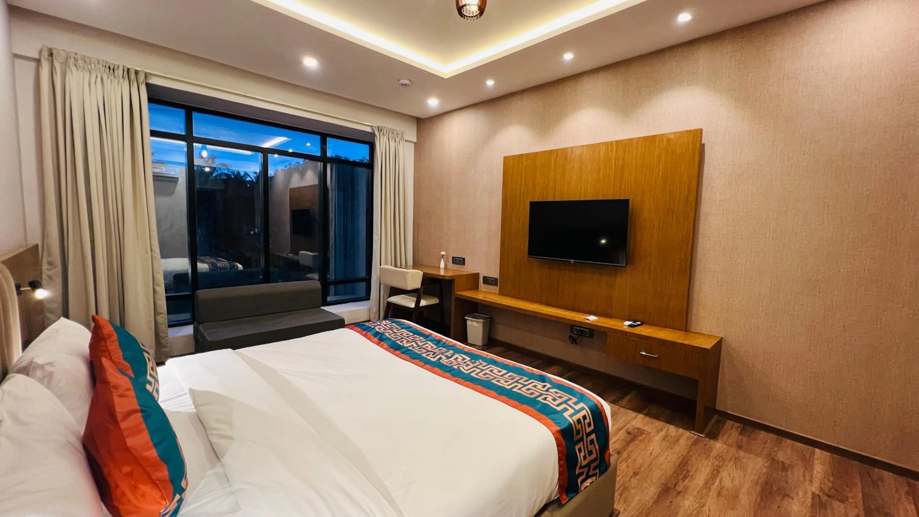 Bed in Hotel Aashraya