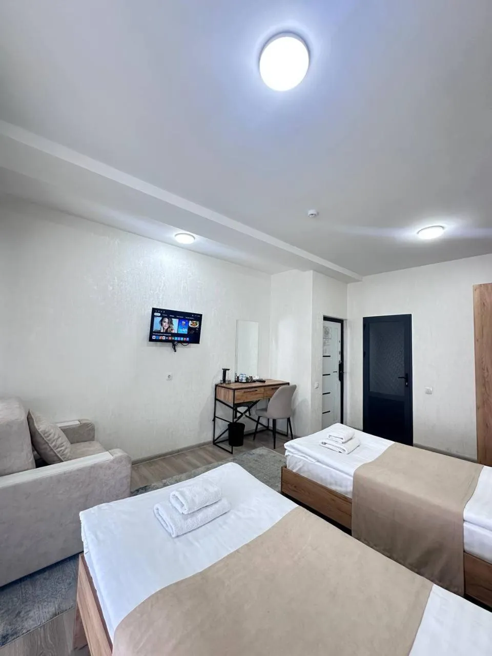 Communal lounge/ TV room, Bed in SADI Hotel