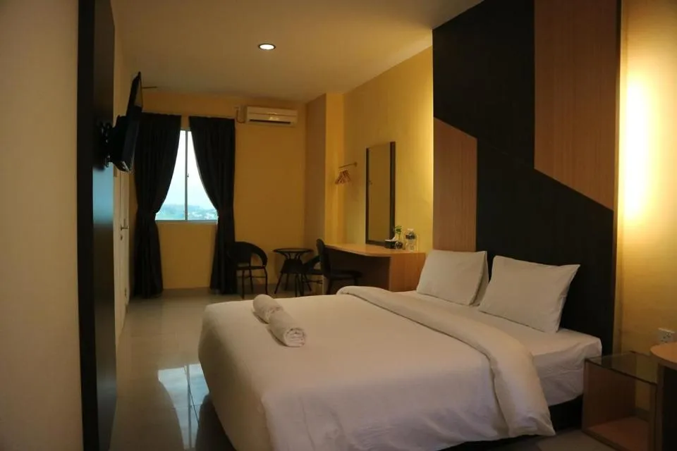 Bed in Baloi View Apartment