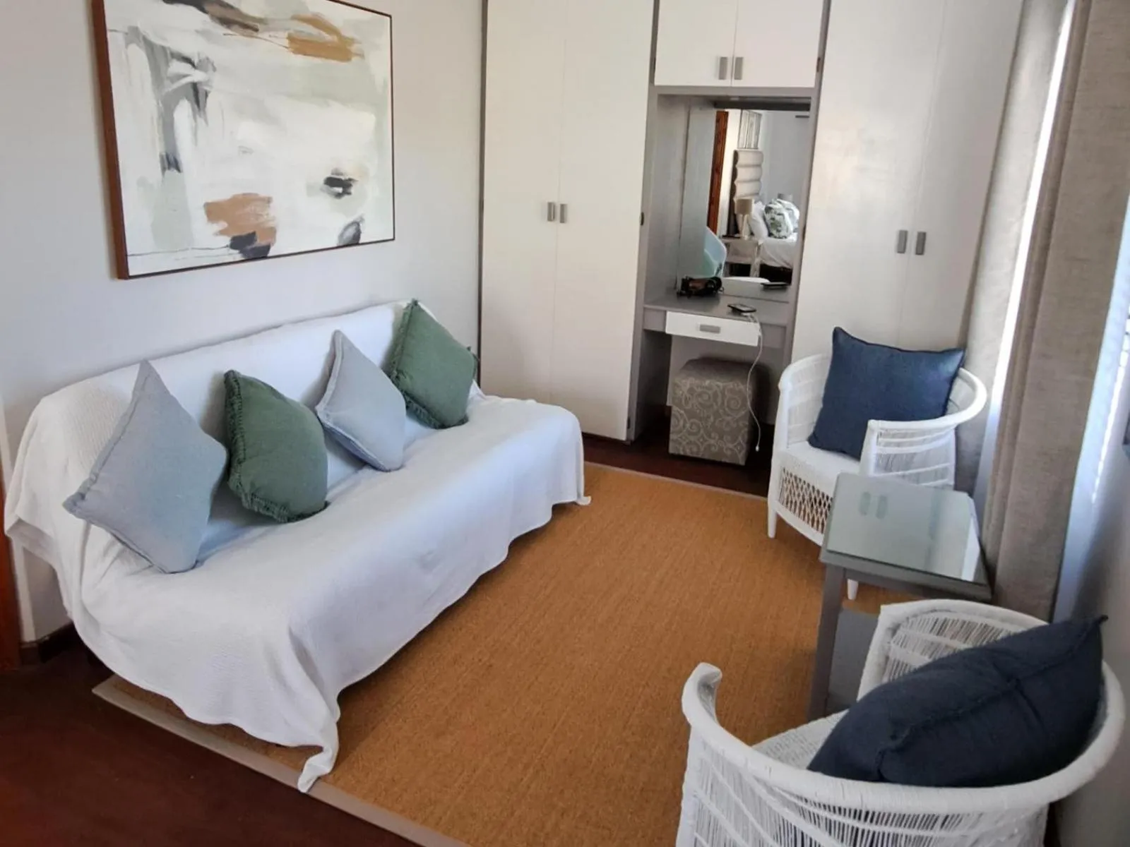 Seating area, Bed in Grace Walk Guest House