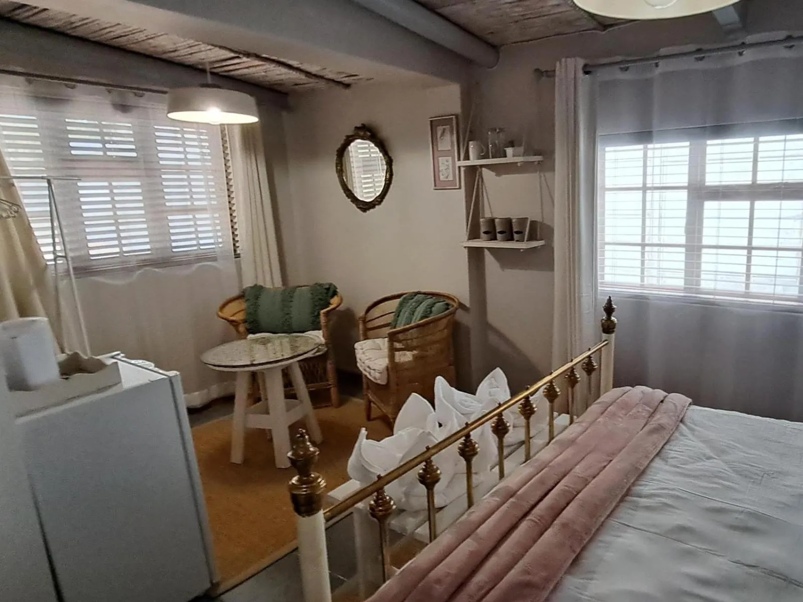 Seating area, Bed in Grace Walk Guest House