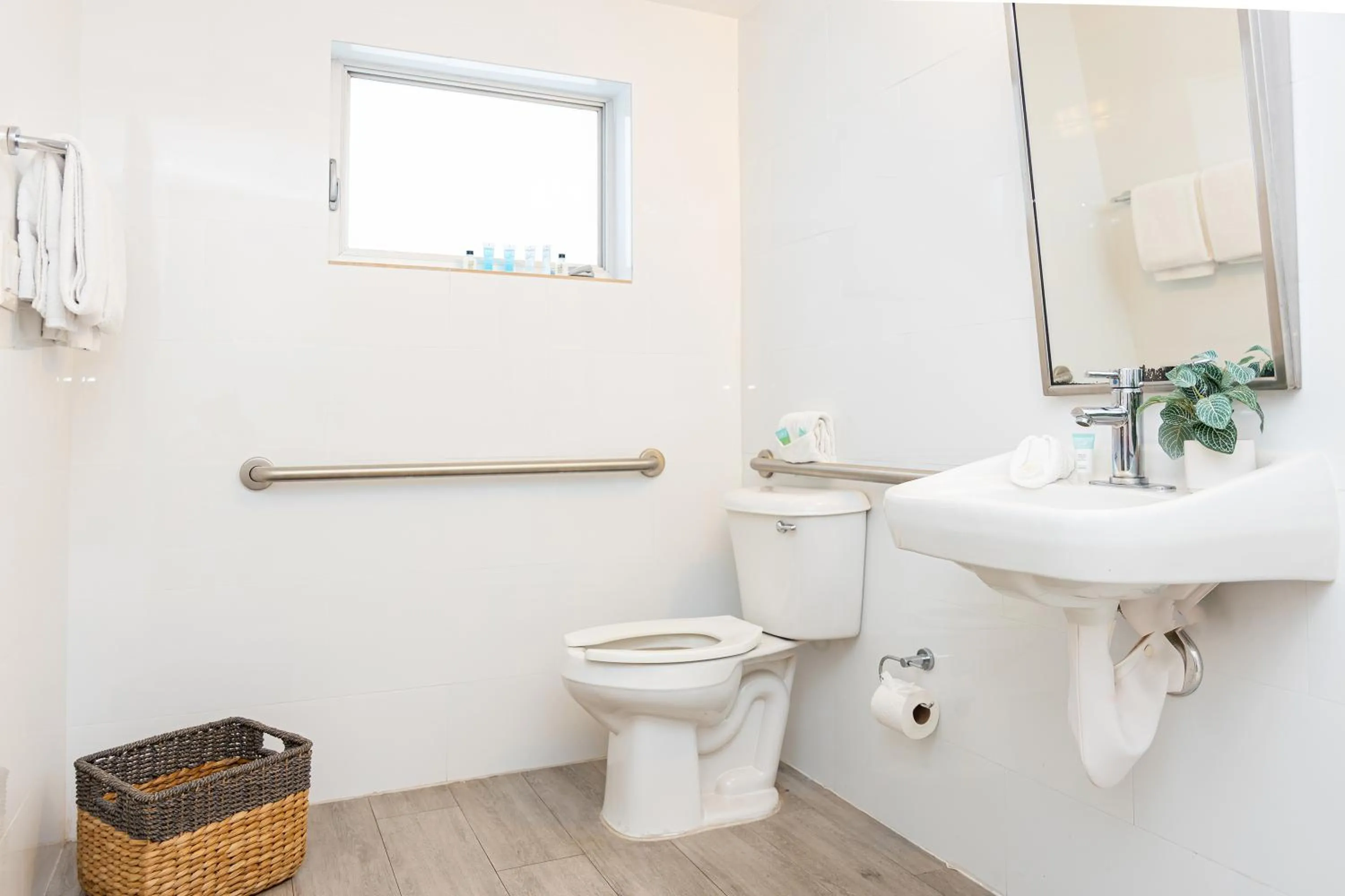 Toilet in Beachside All Suites Hotel