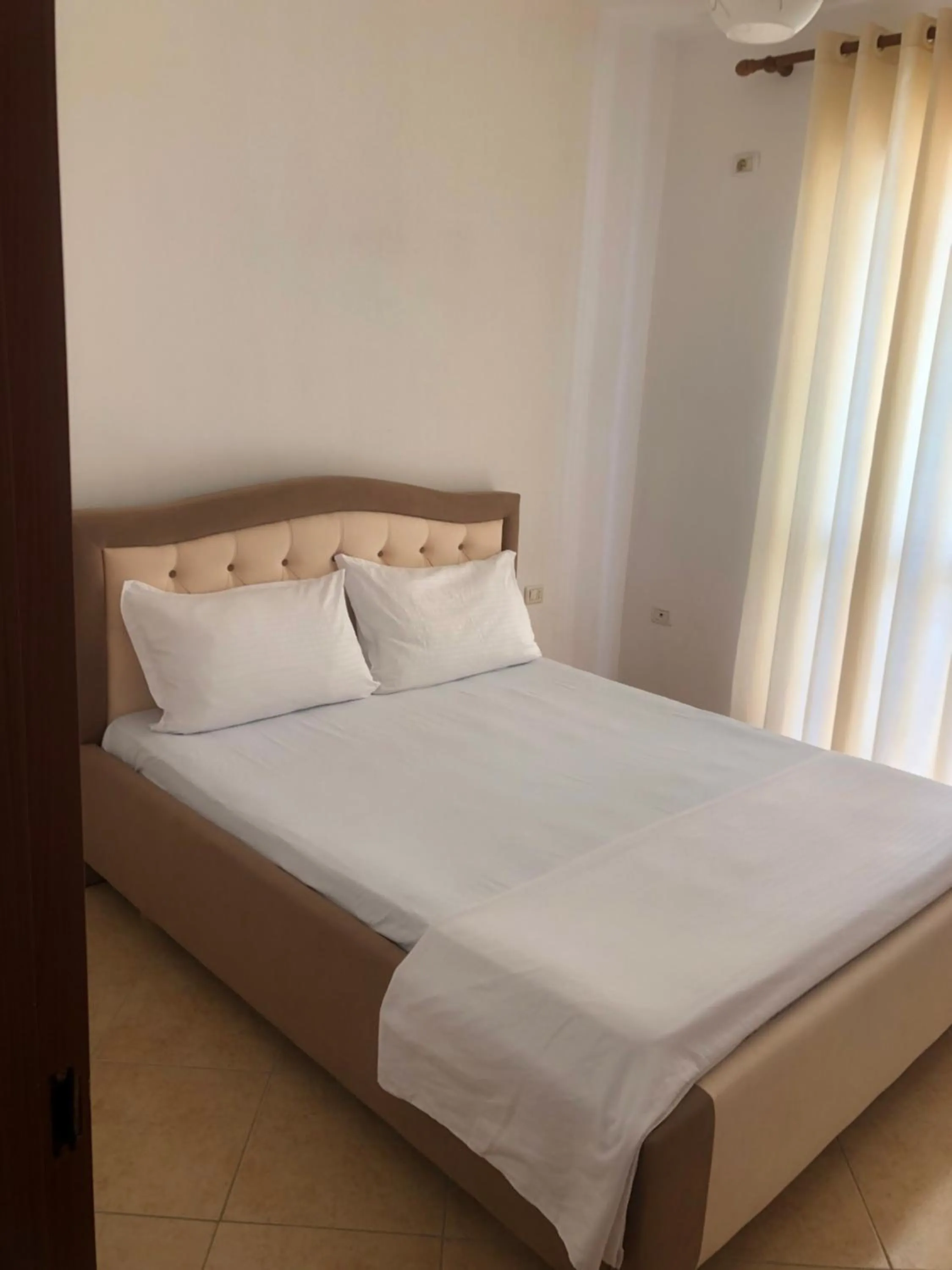 Bed in Besi Apartments