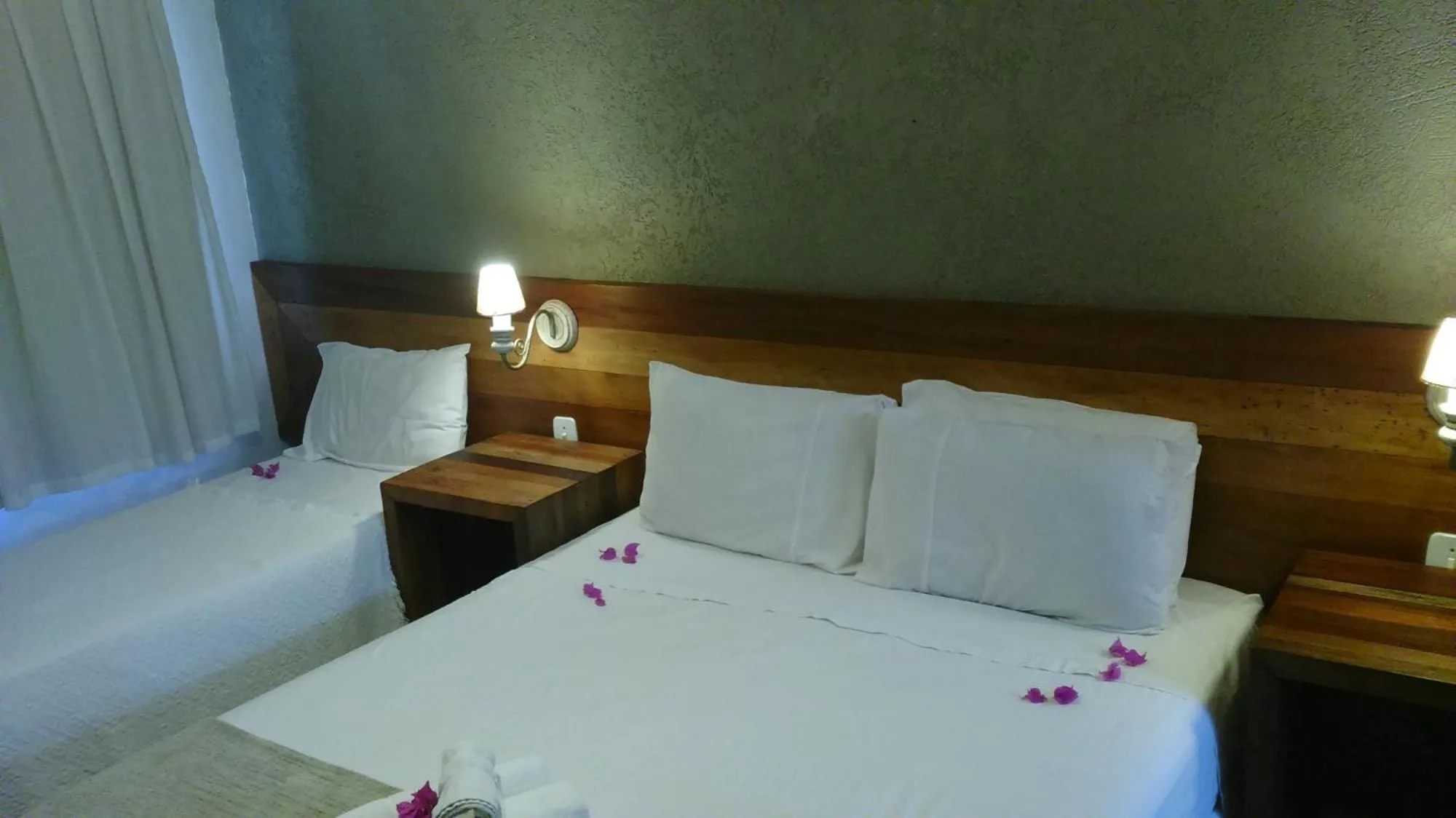 Bed in Pousada Praia João Fernandes