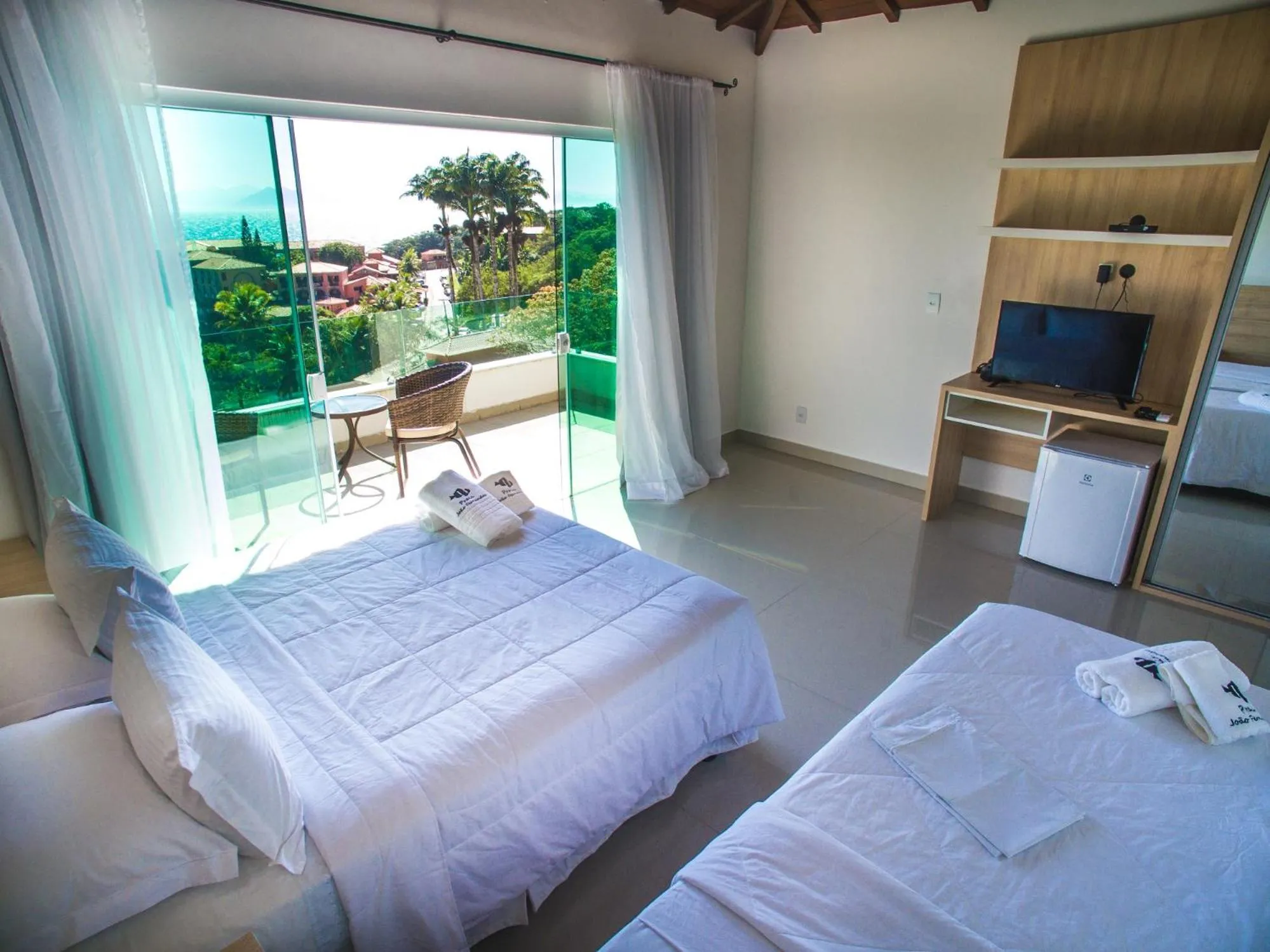 Bed in Pousada Praia João Fernandes