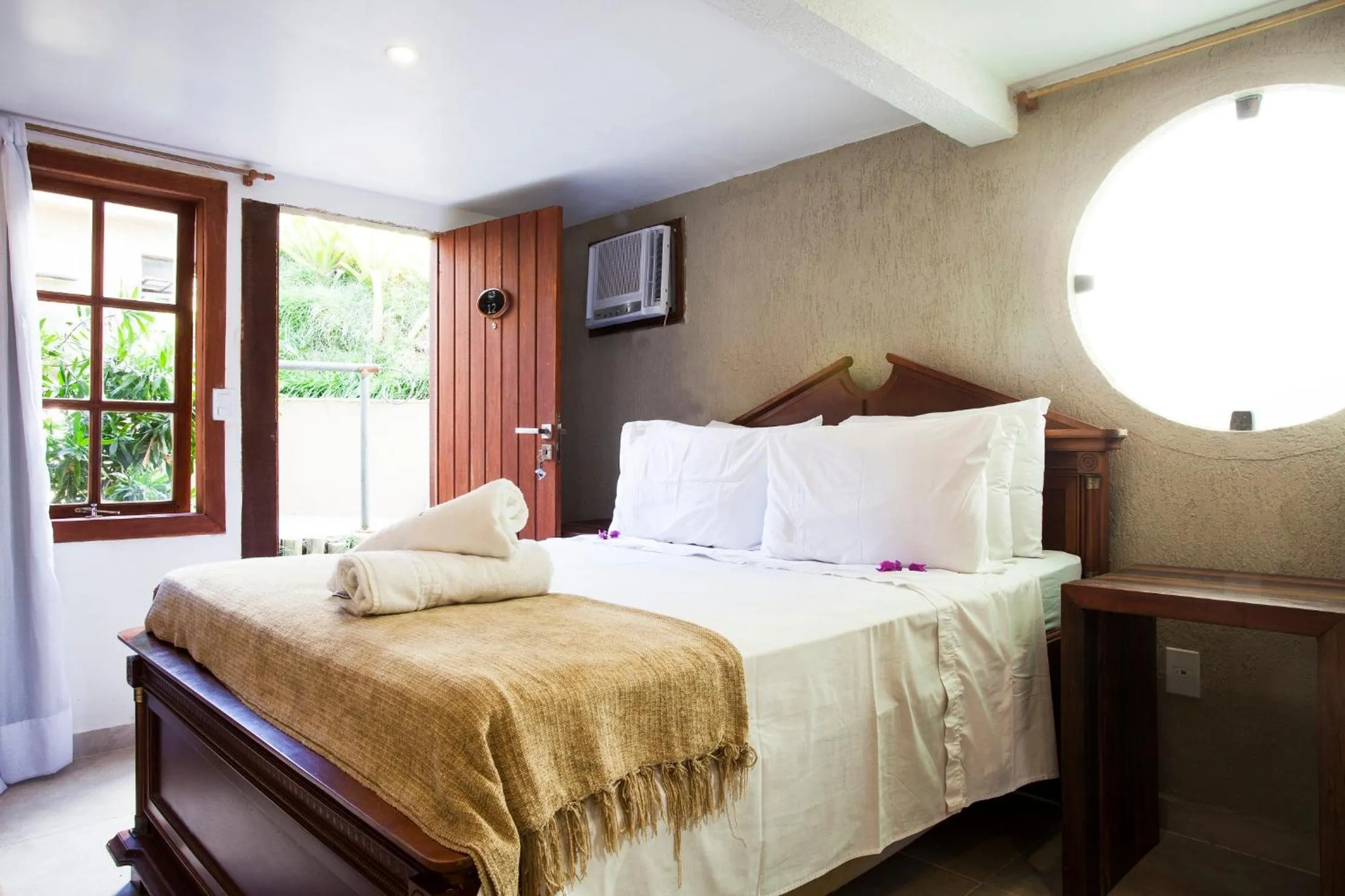 Bed in Pousada Praia João Fernandes