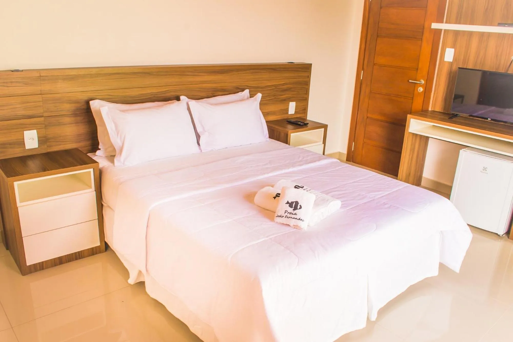 Bed in Pousada Praia João Fernandes