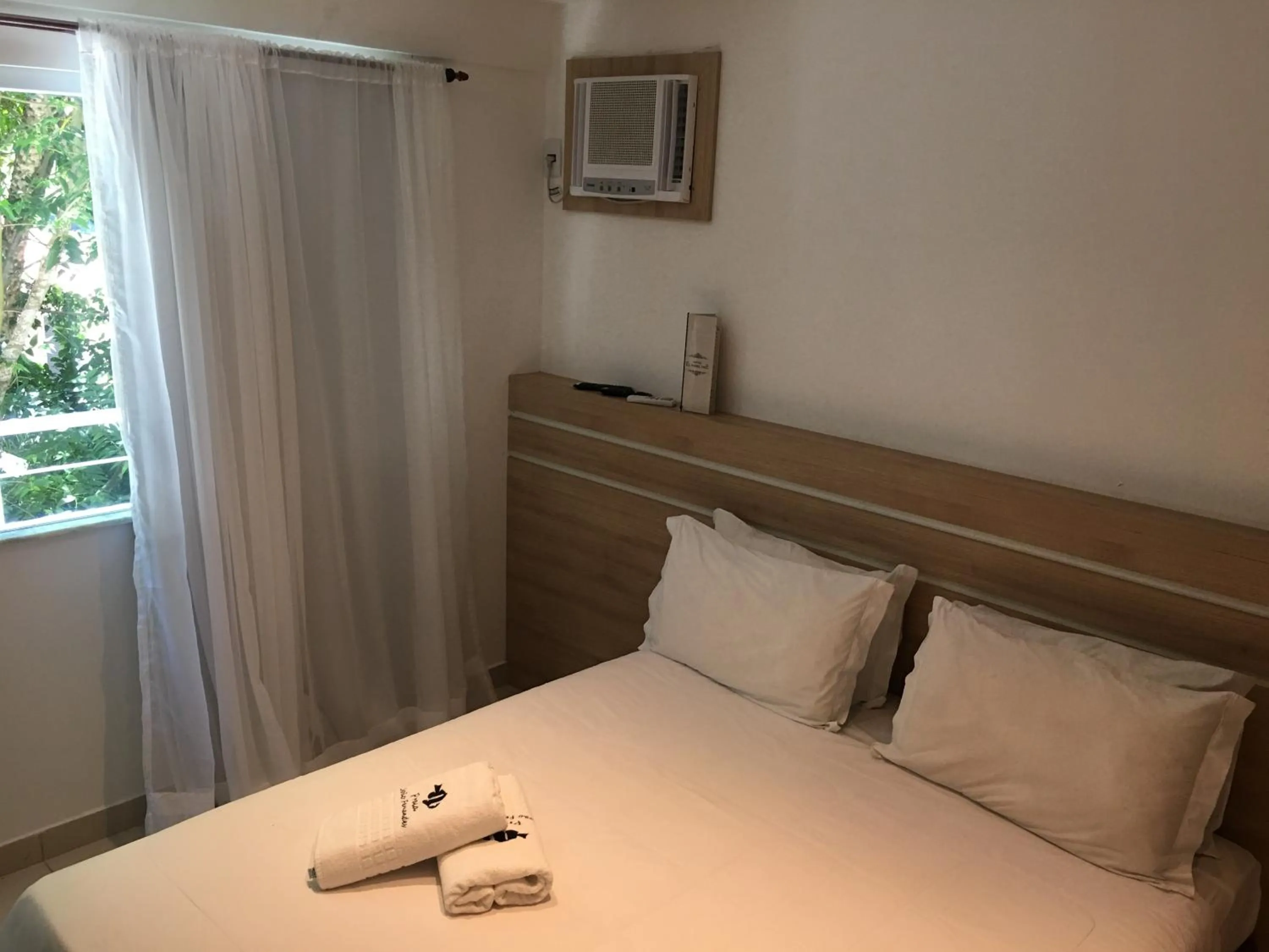 Bed in Pousada Praia João Fernandes