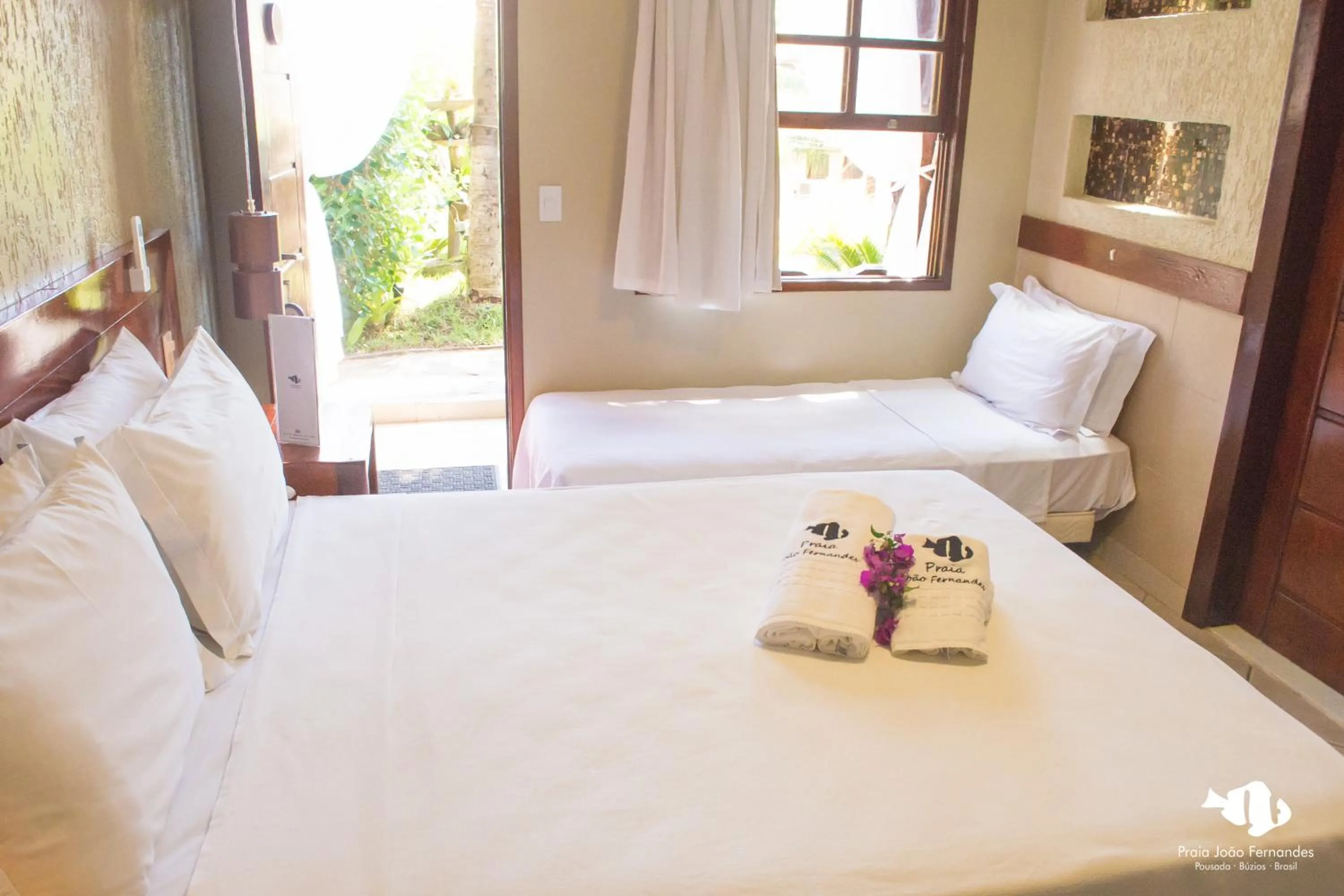 Bed in Pousada Praia João Fernandes