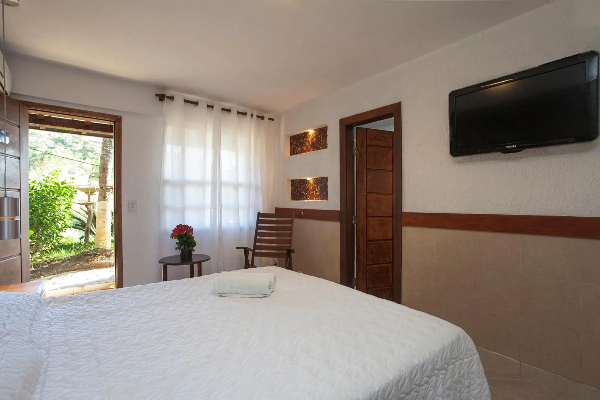 Bed in Pousada Praia João Fernandes