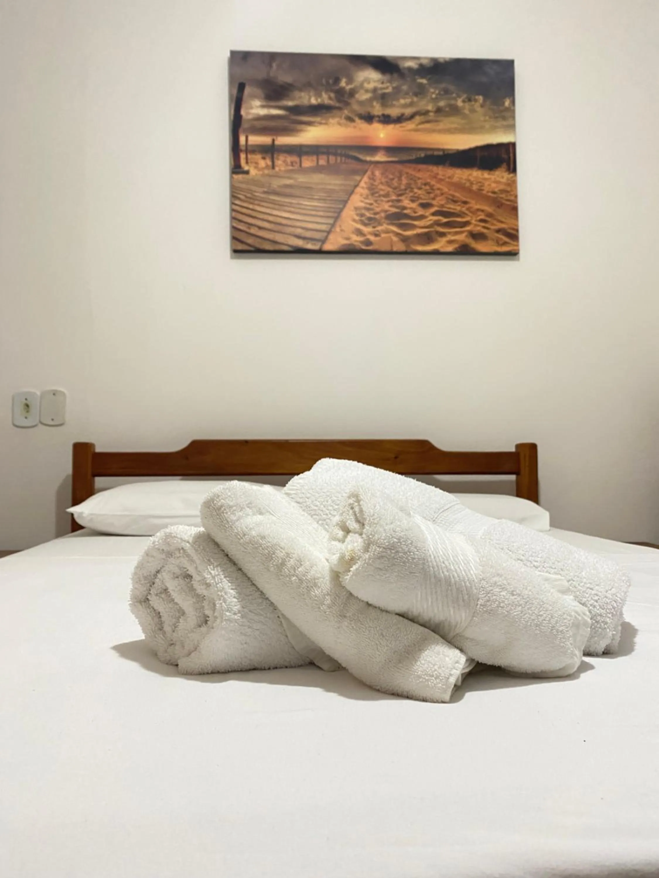 Bed in Pousada Arraial Suites