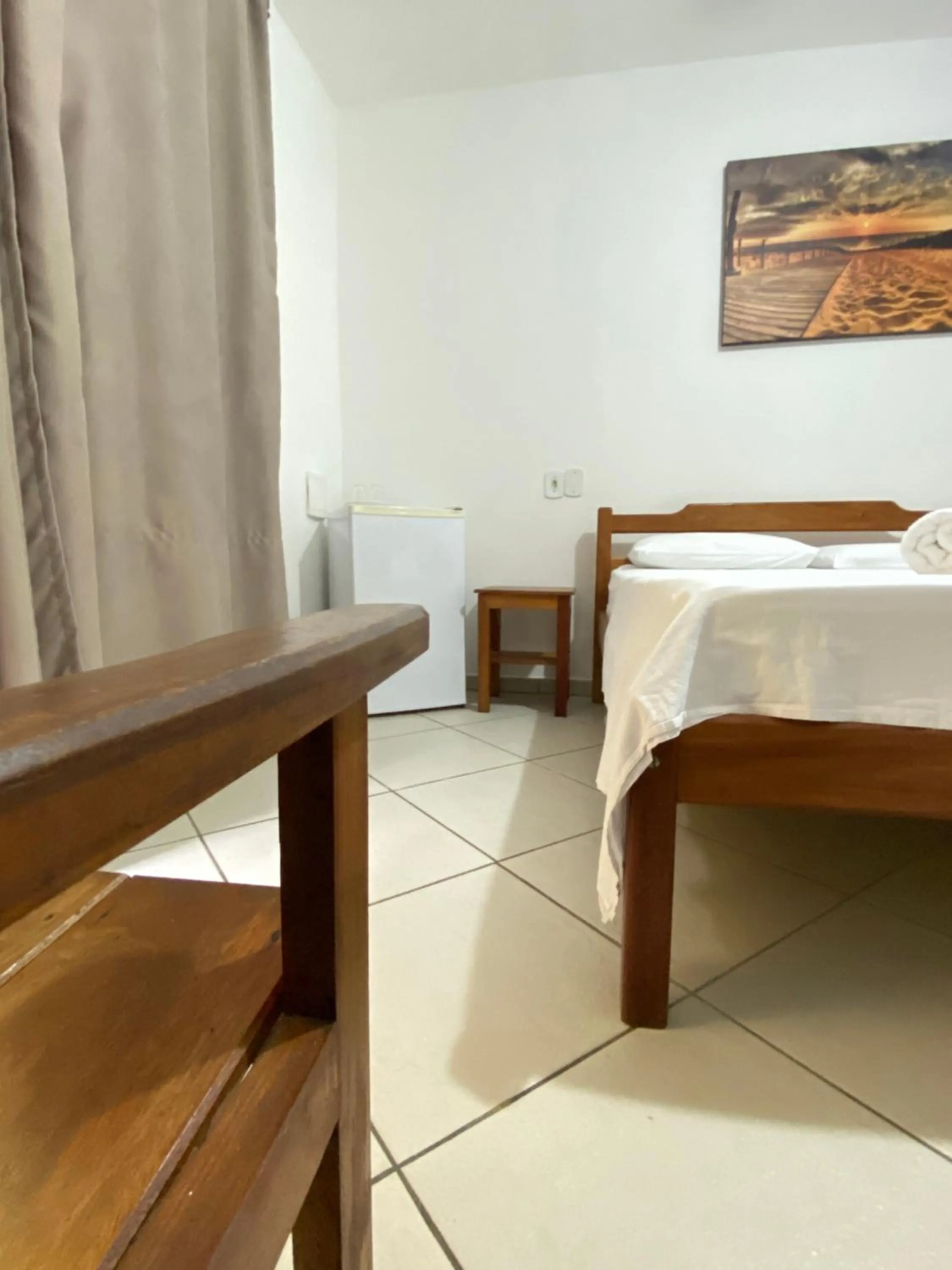 Bed in Pousada Arraial Suites