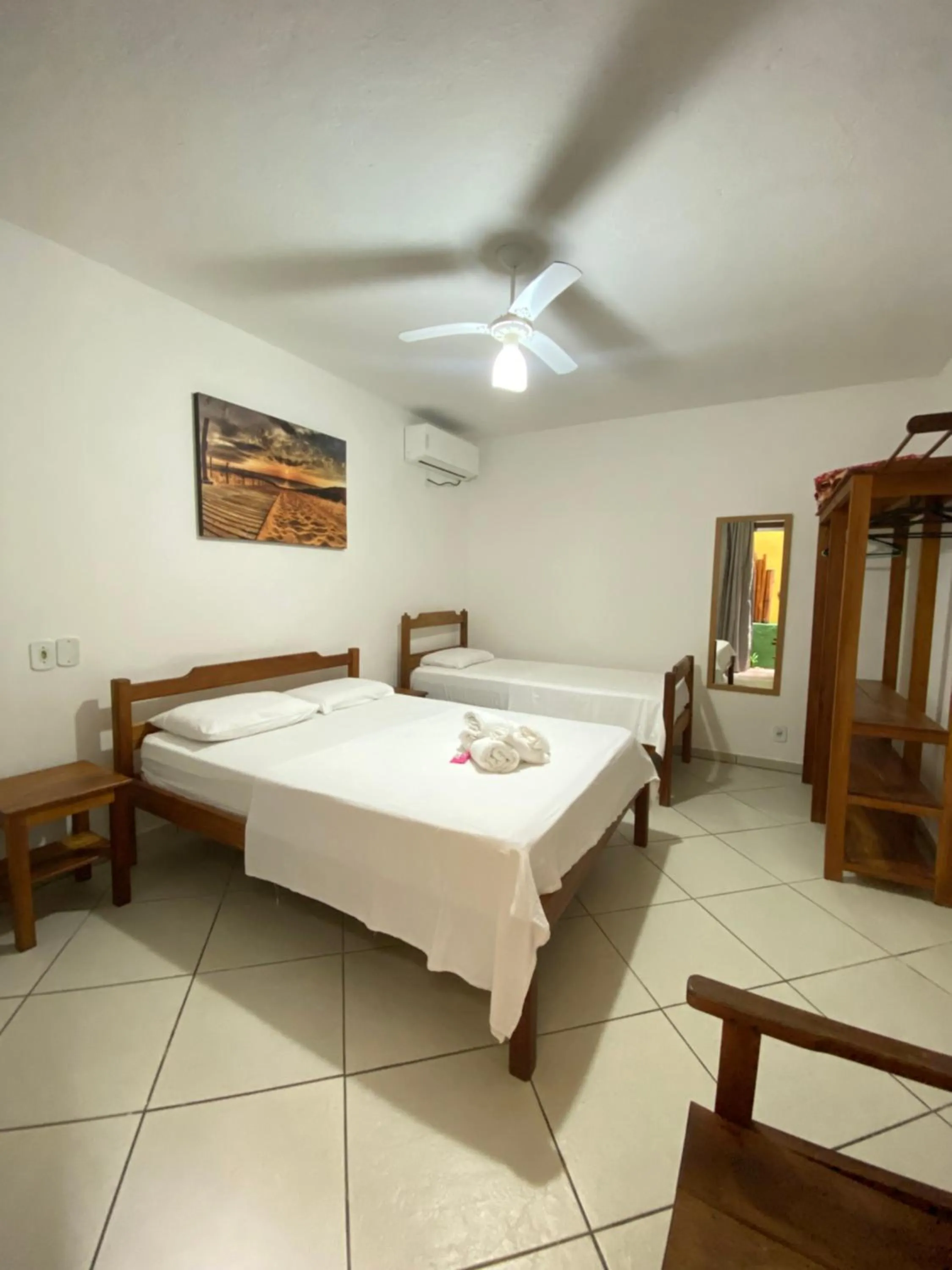 Bed in Pousada Arraial Suites