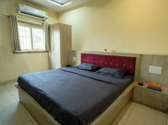 Bed in Majestic Hotel and Restro