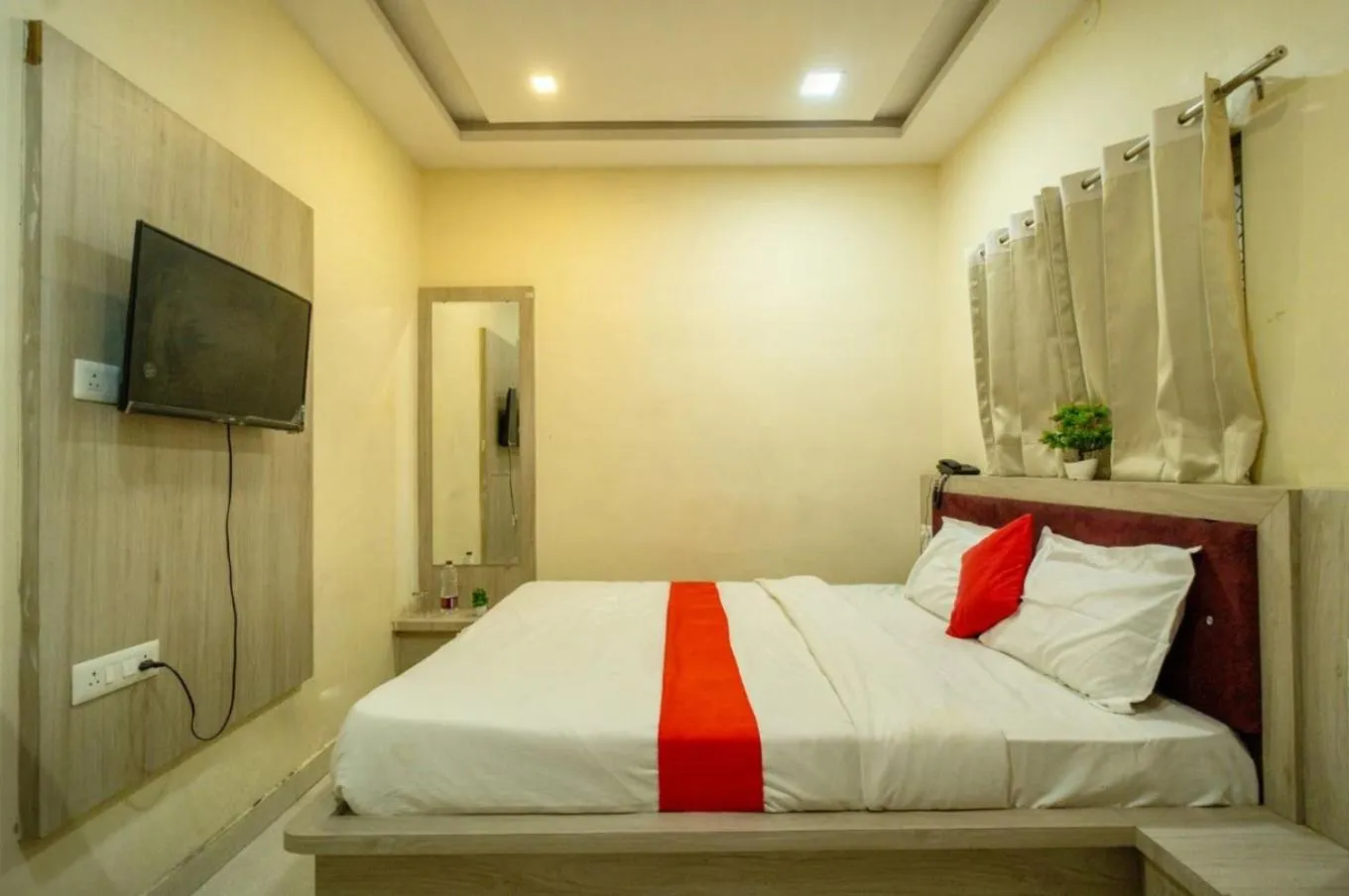 Bed in Majestic Hotel and Restro