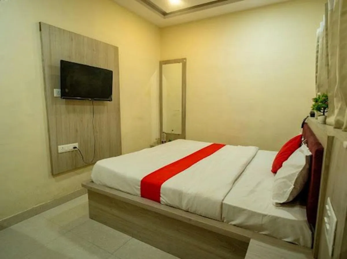 Bed in Majestic Hotel and Restro