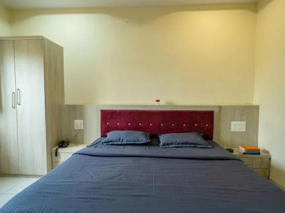 Bed in Majestic Hotel and Restro