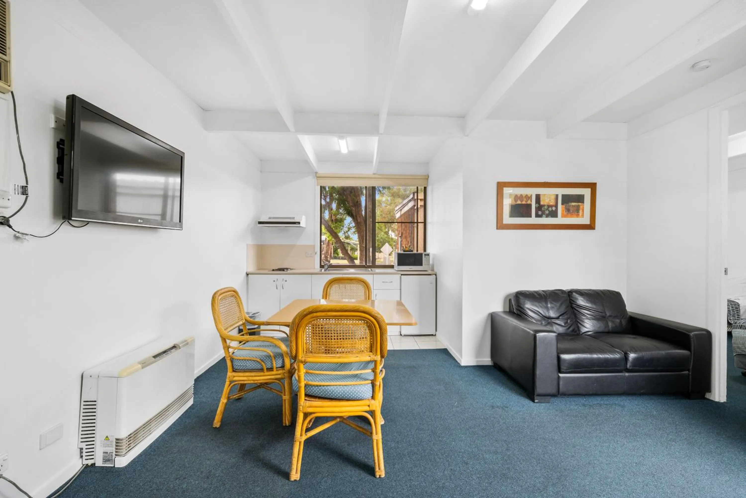 Communal lounge/ TV room in Sundown Villas