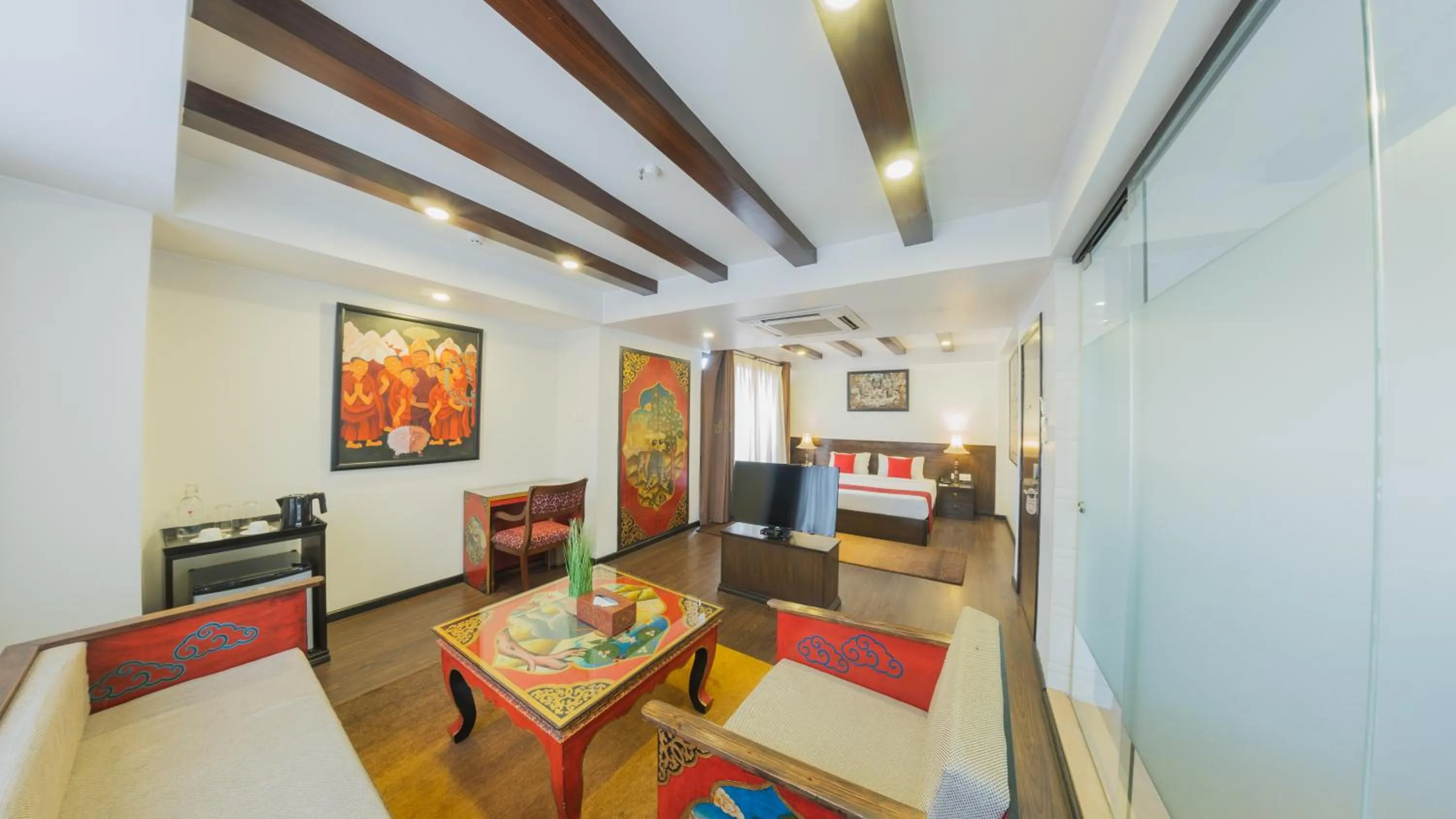 Communal lounge/ TV room, Bed in Dalai-La Boutique Hotel