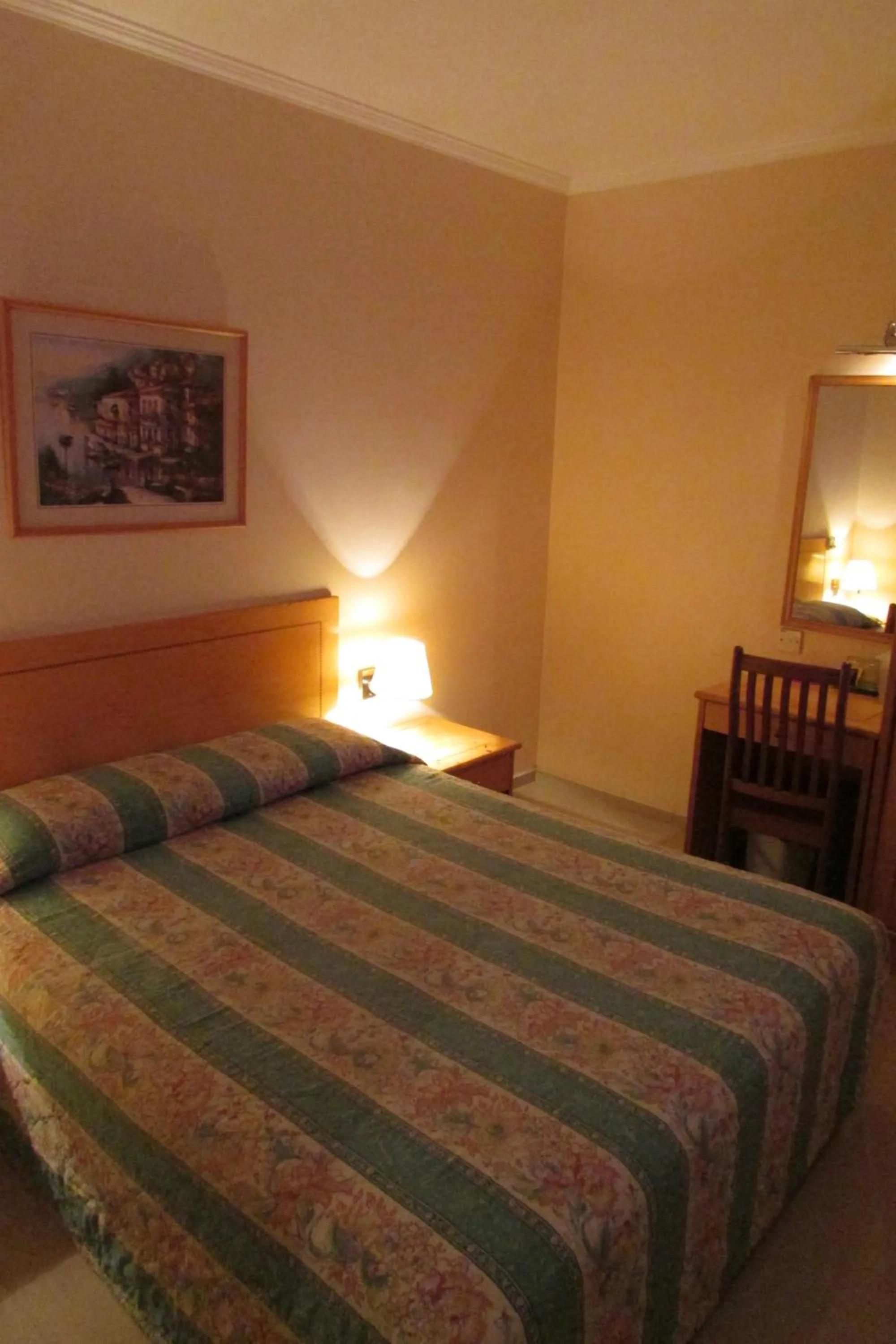 Bed in New Orchid Hotel