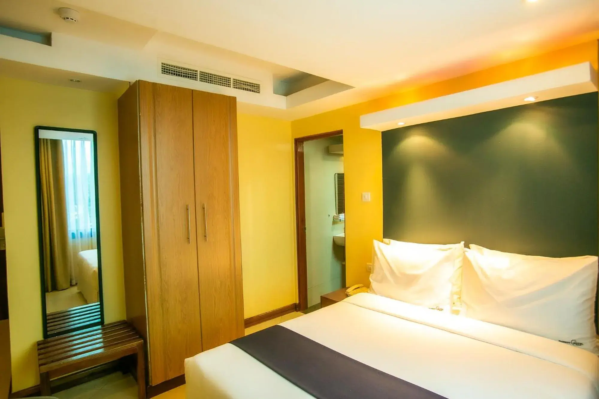 Bed in Parrot Hotel Arusha Bed in Parrot Hotel Arusha