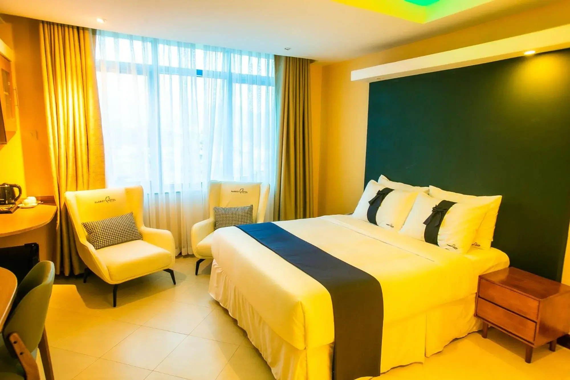 Bed in Parrot Hotel Arusha Bed in Parrot Hotel Arusha