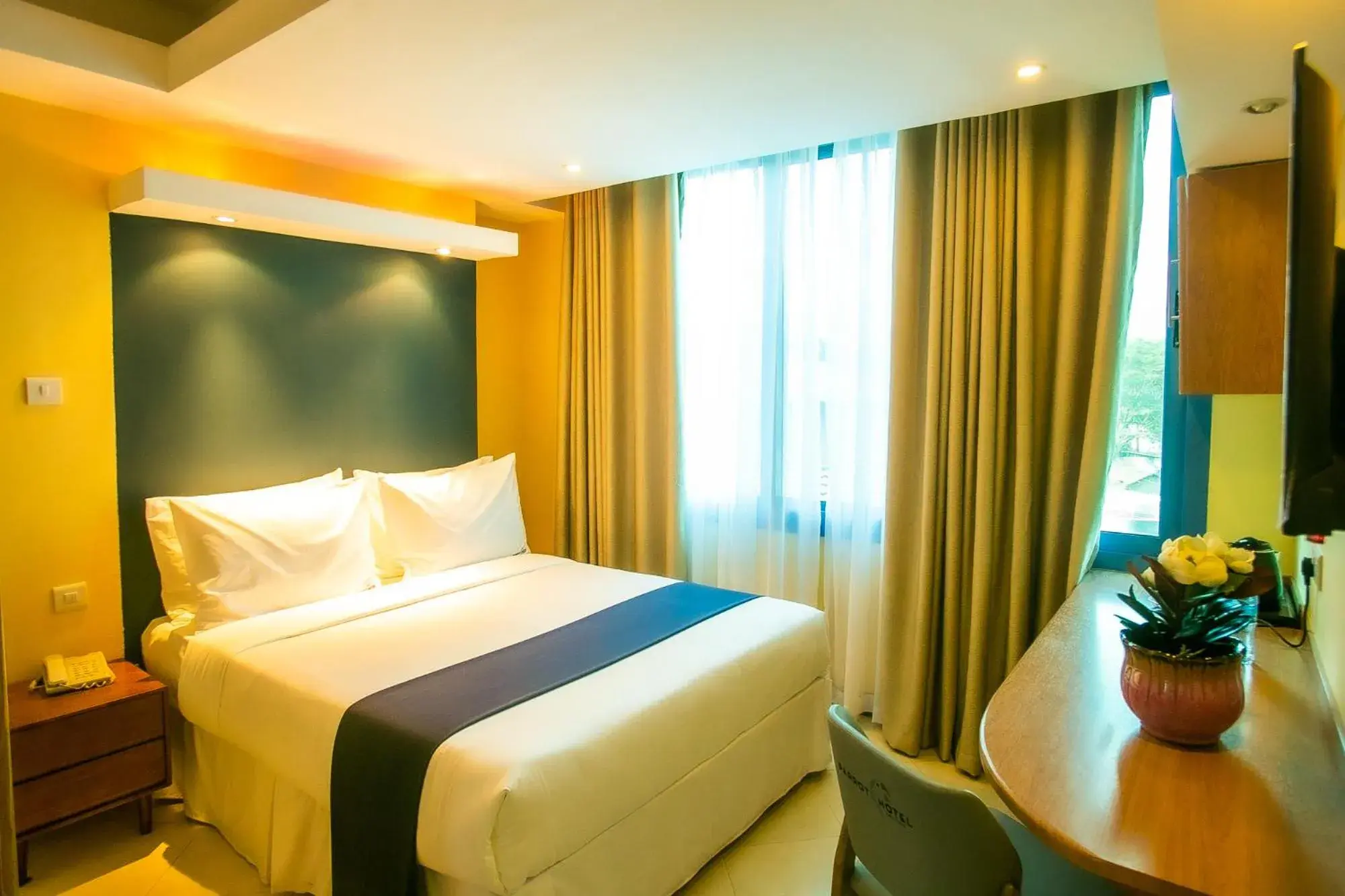 Bed in Parrot Hotel Arusha Bed in Parrot Hotel Arusha