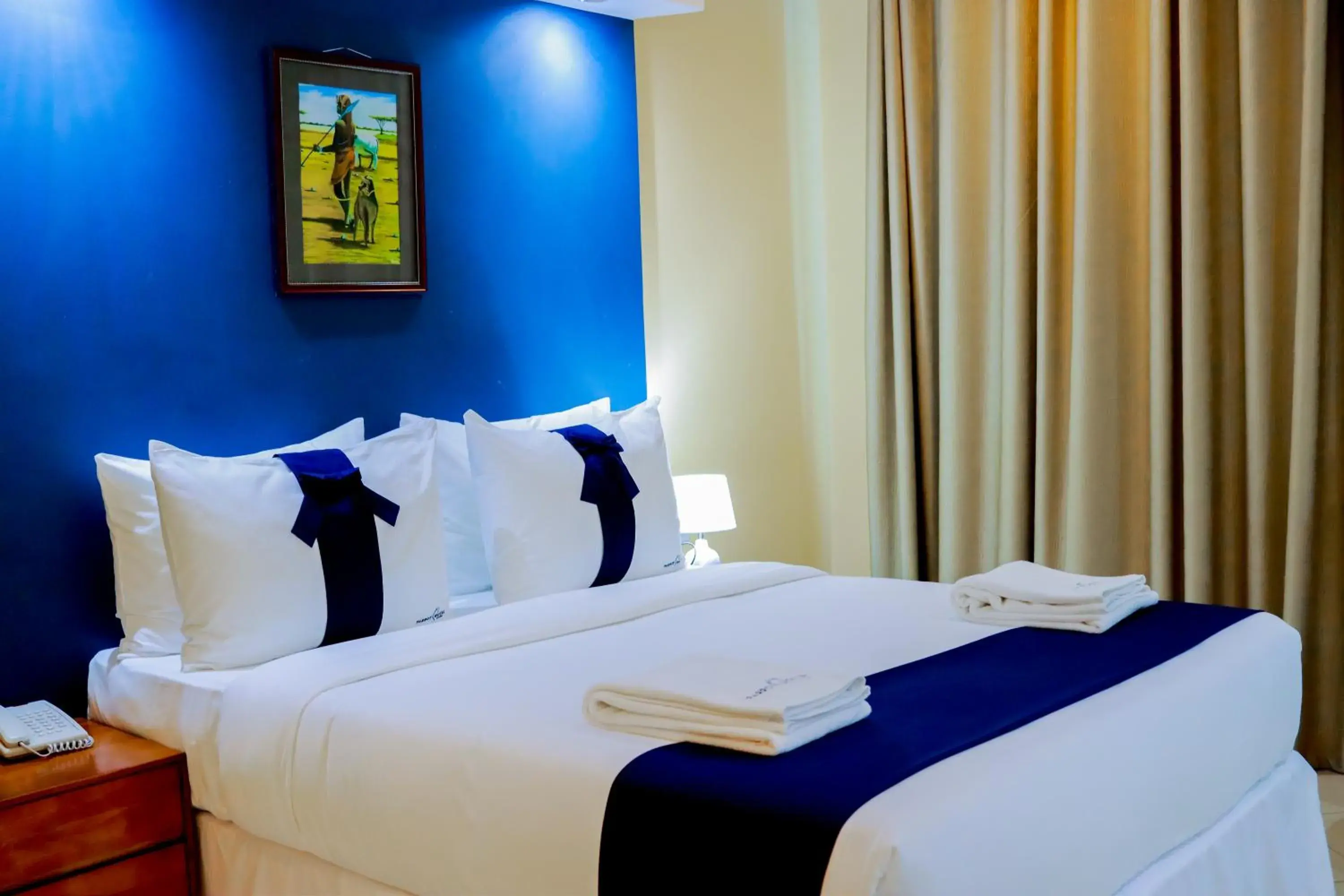 Bed in Parrot Hotel Arusha Bed in Parrot Hotel Arusha