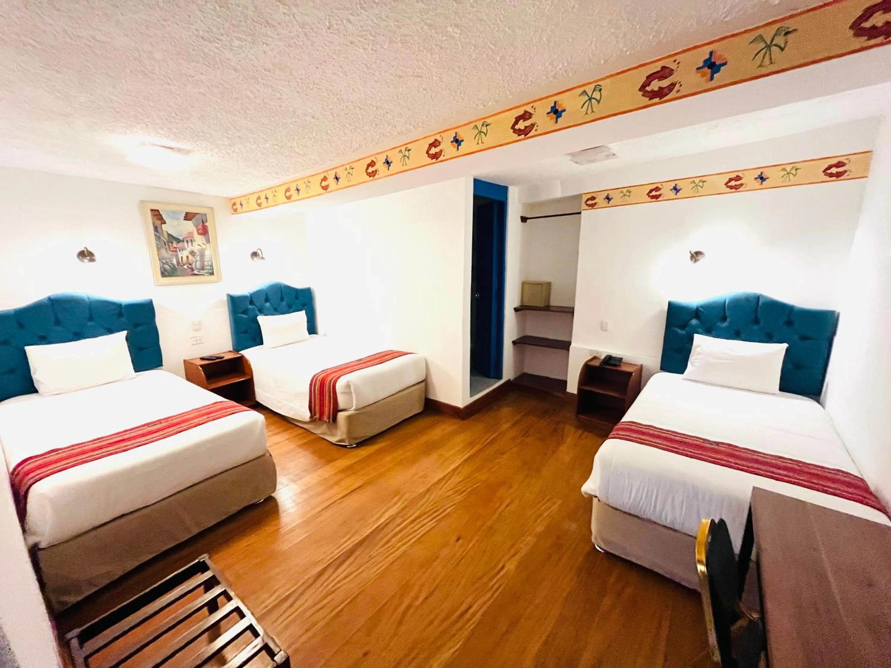 Photo of the whole room, Bed in Rojas Plaza Boutique