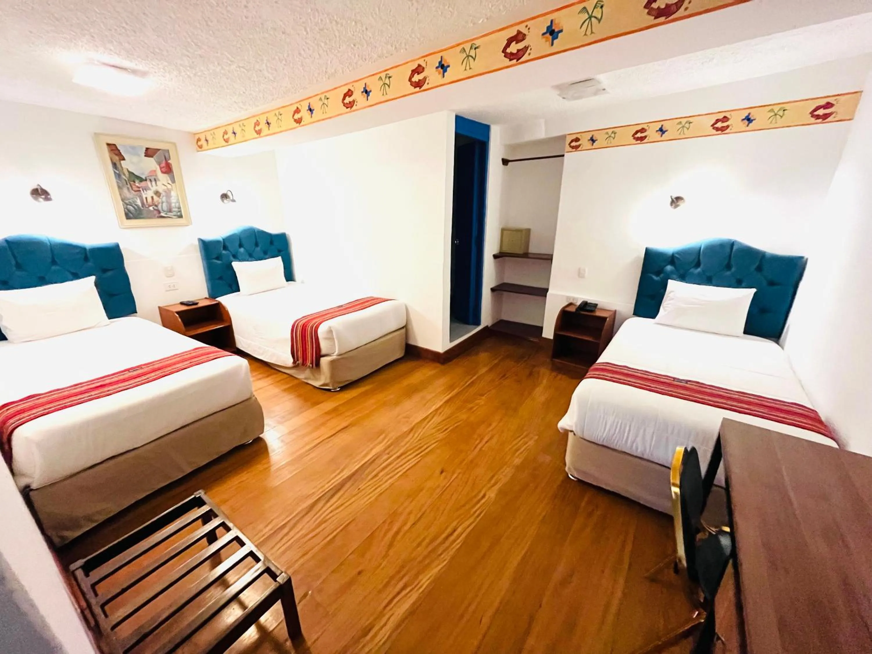 Photo of the whole room, Bed in Rojas Plaza Boutique