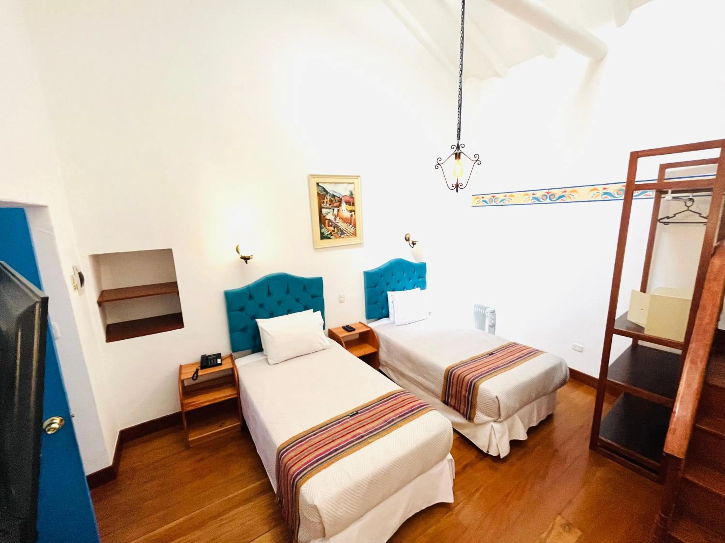 TV and multimedia, Bed in Rojas Plaza Boutique