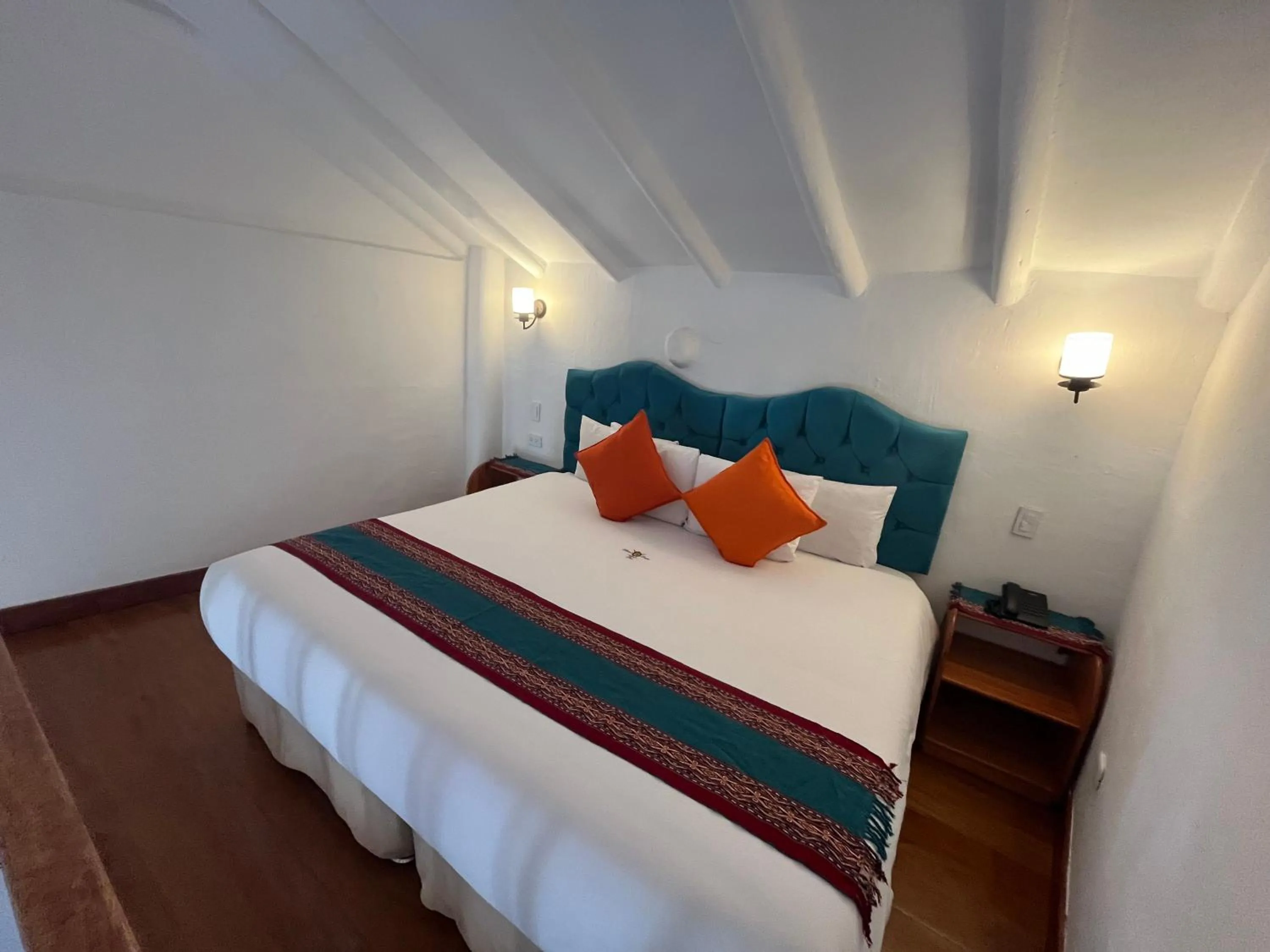 Photo of the whole room, Bed in Rojas Plaza Boutique