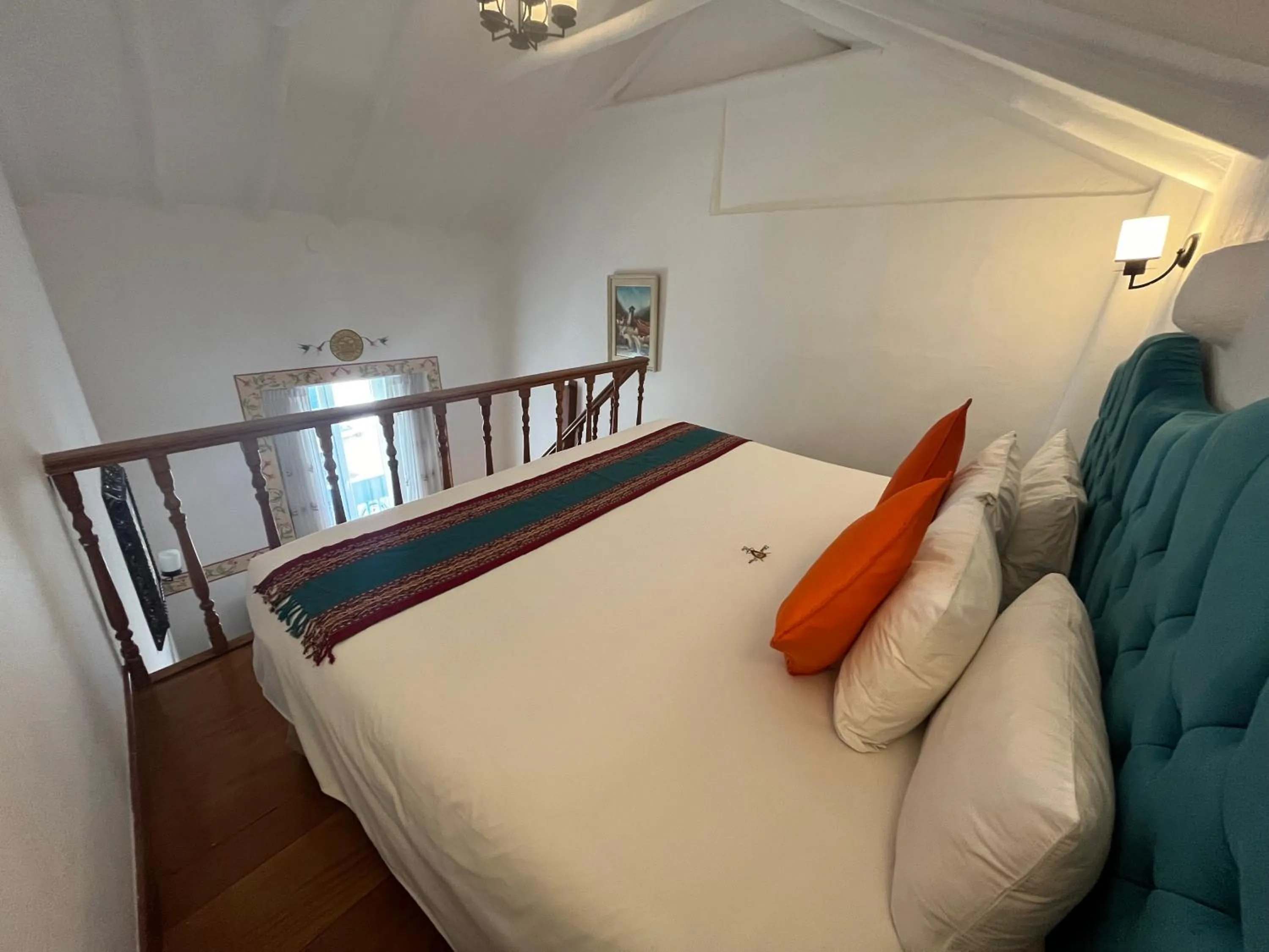 Photo of the whole room, Bed in Rojas Plaza Boutique