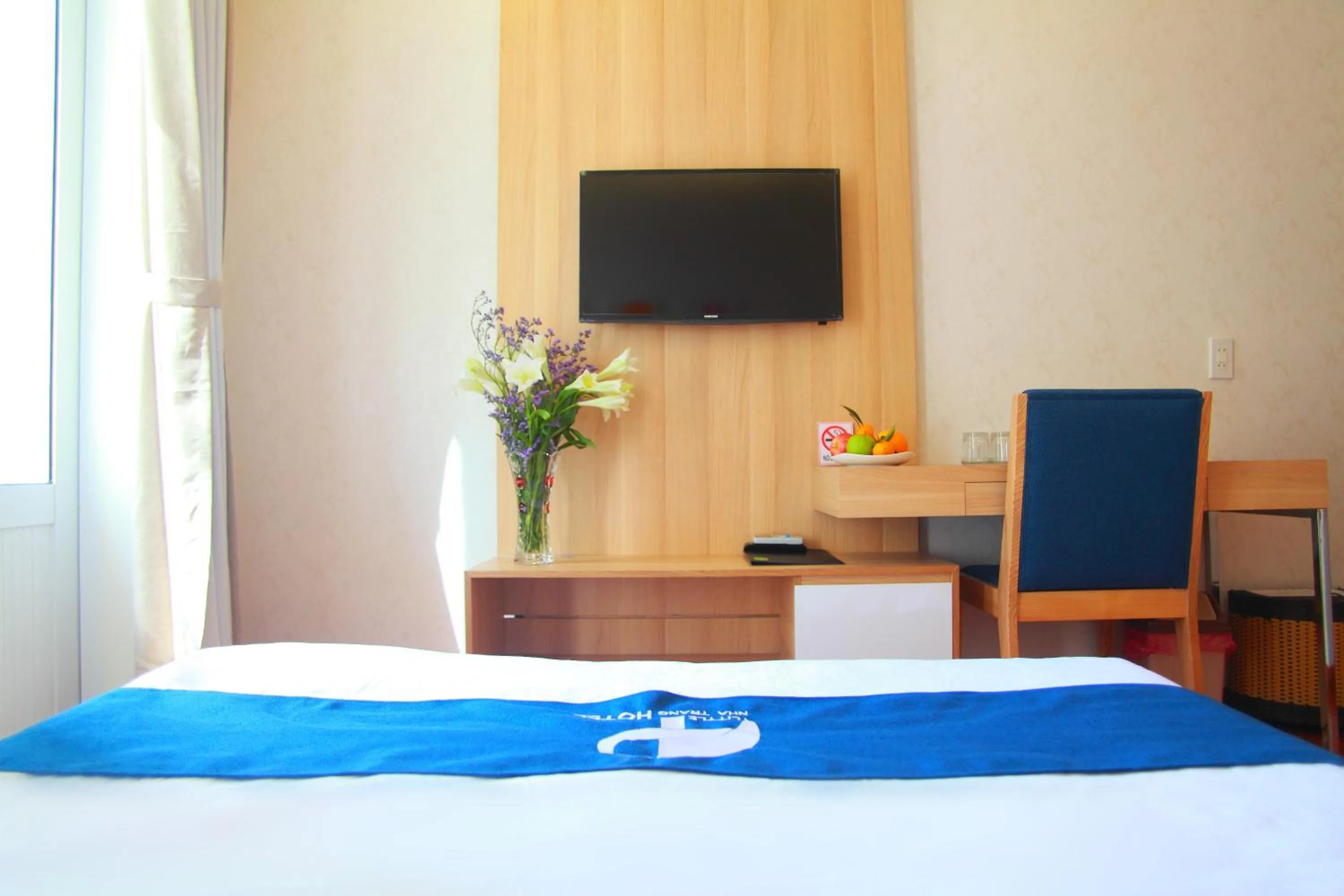 TV and multimedia, Bed in Little Nha Trang Hotel