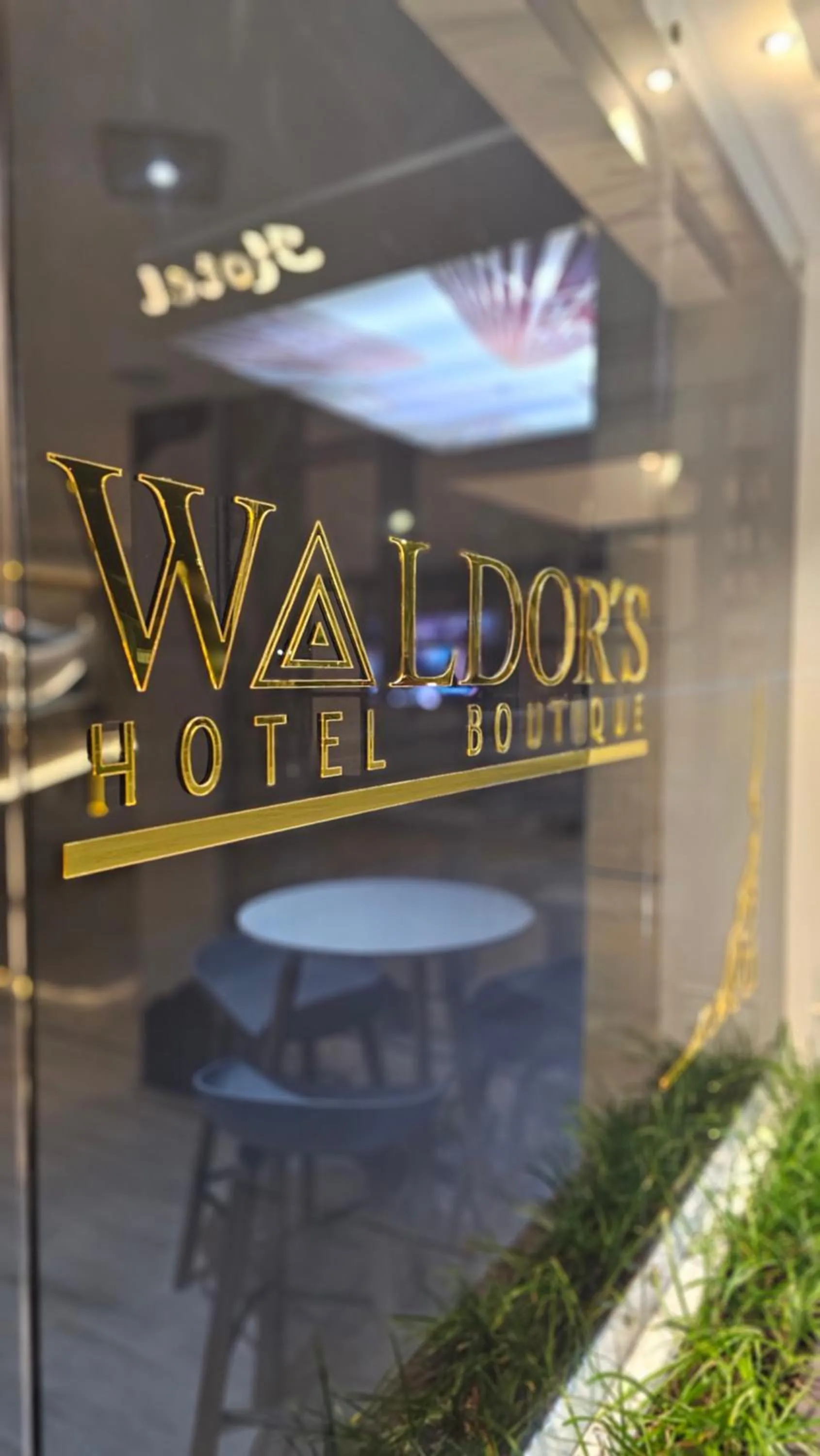 Property logo or sign in Waldor's Hotel Boutique