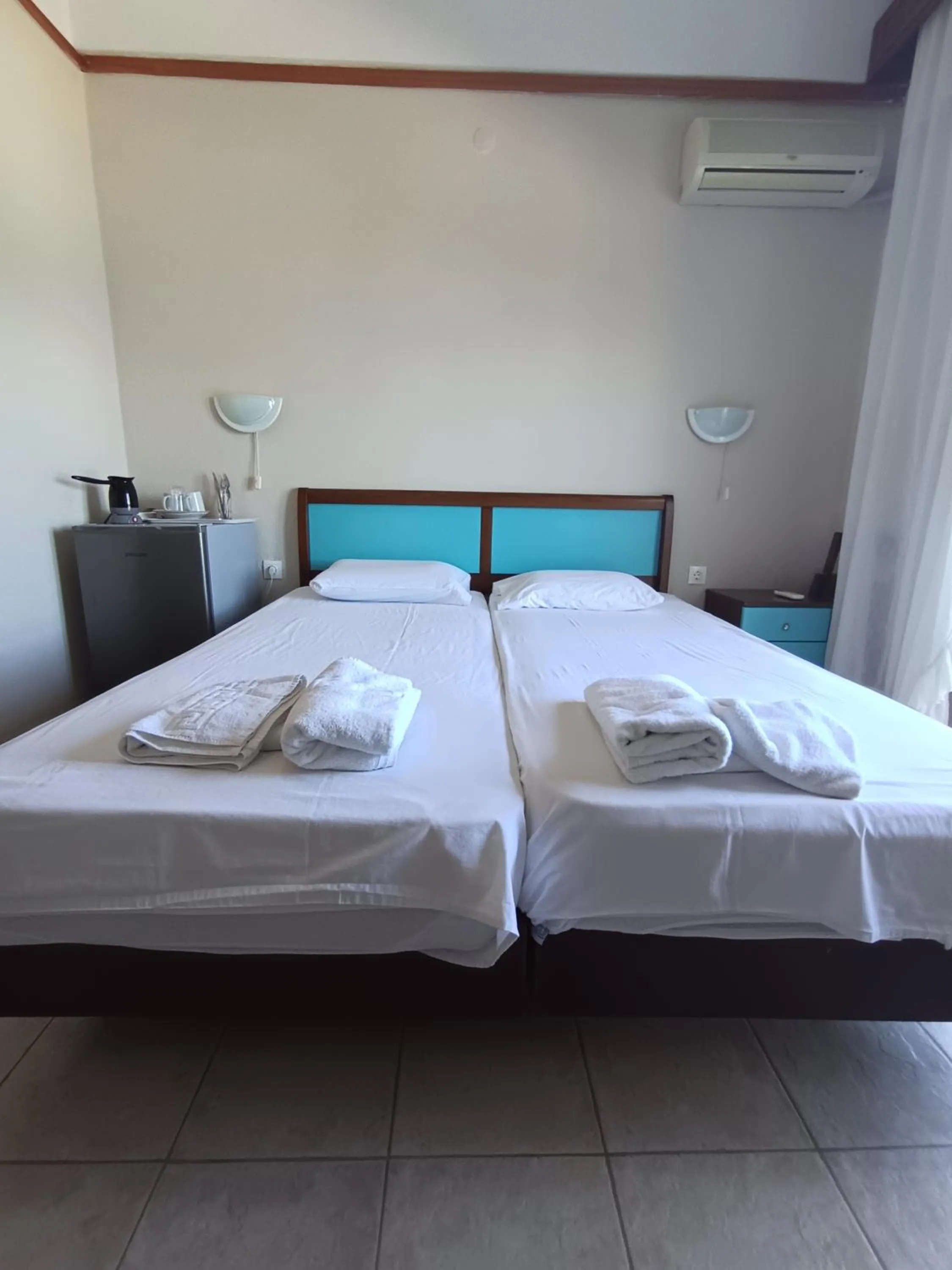 Bed in Aegean Hotel