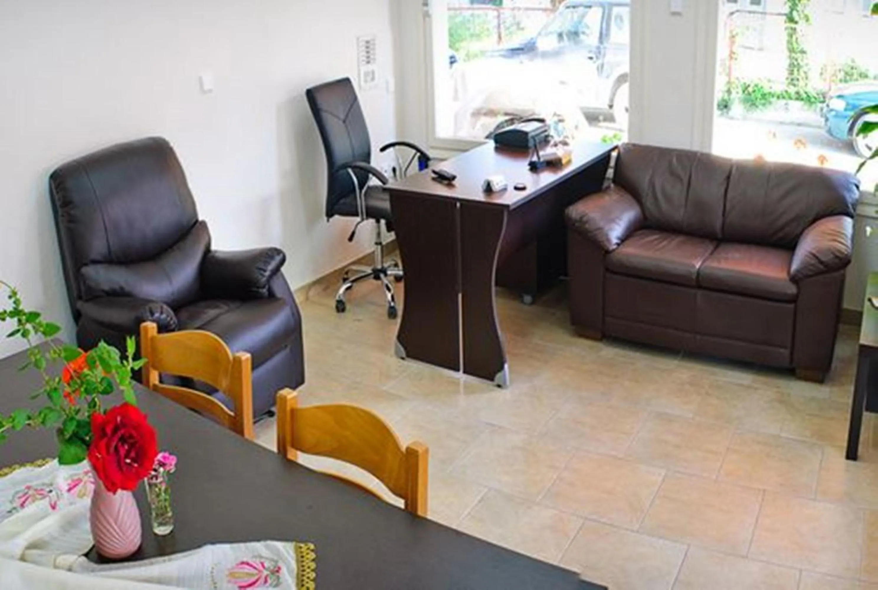 Communal lounge/ TV room in Aegean Hotel