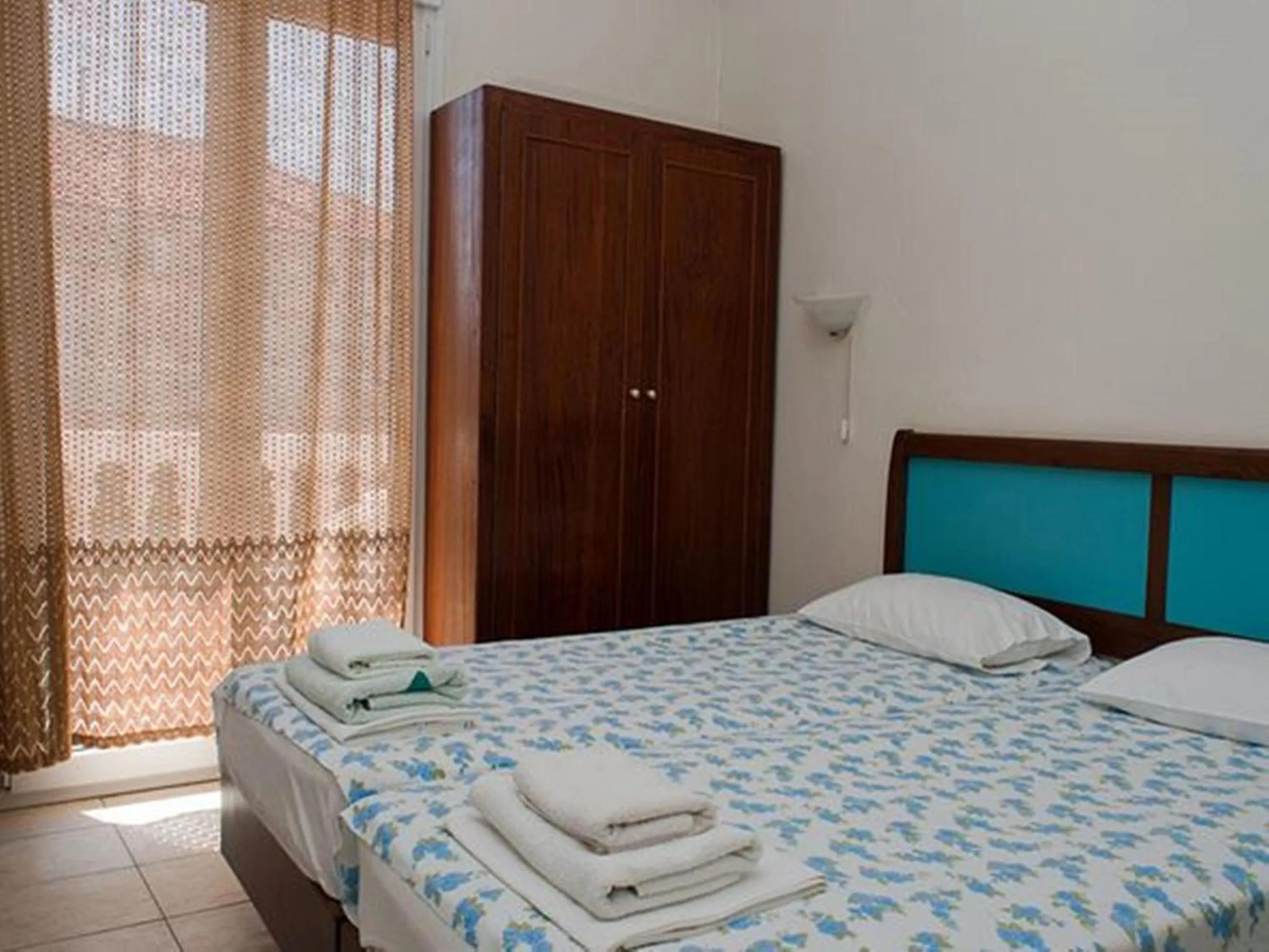Bed in Aegean Hotel