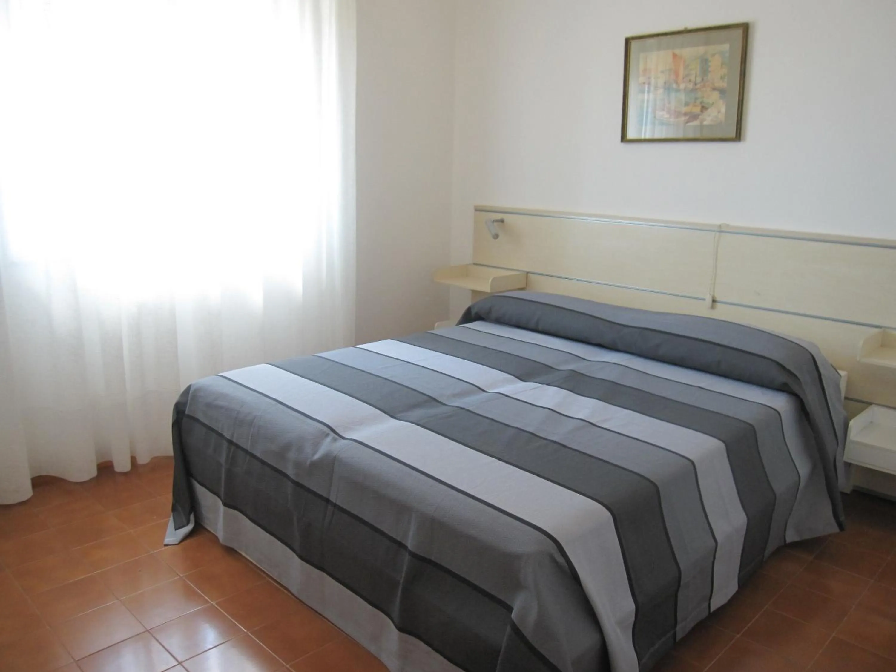 Bed in Appartamento Due Stelle
