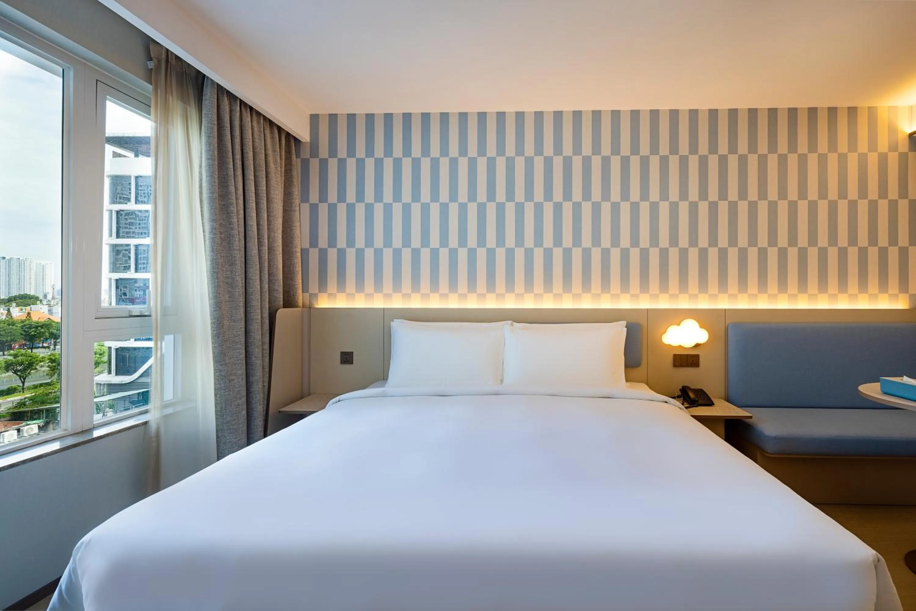 Bed in HANTING HOTEL HO CHI MINH City - 胡志明汉庭国际中心酒店