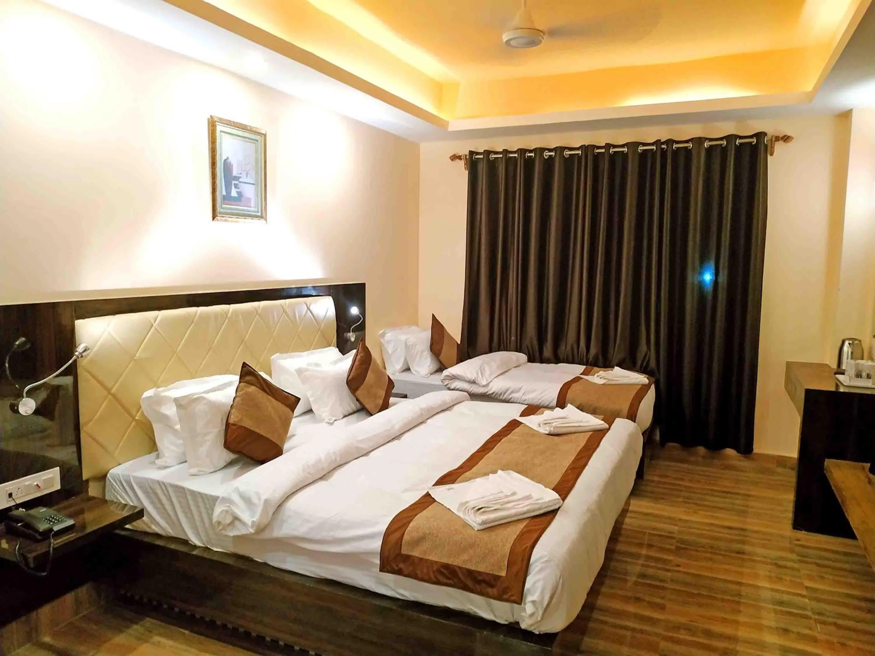 Deluxe Triple Room in Garden Retreat Hotel