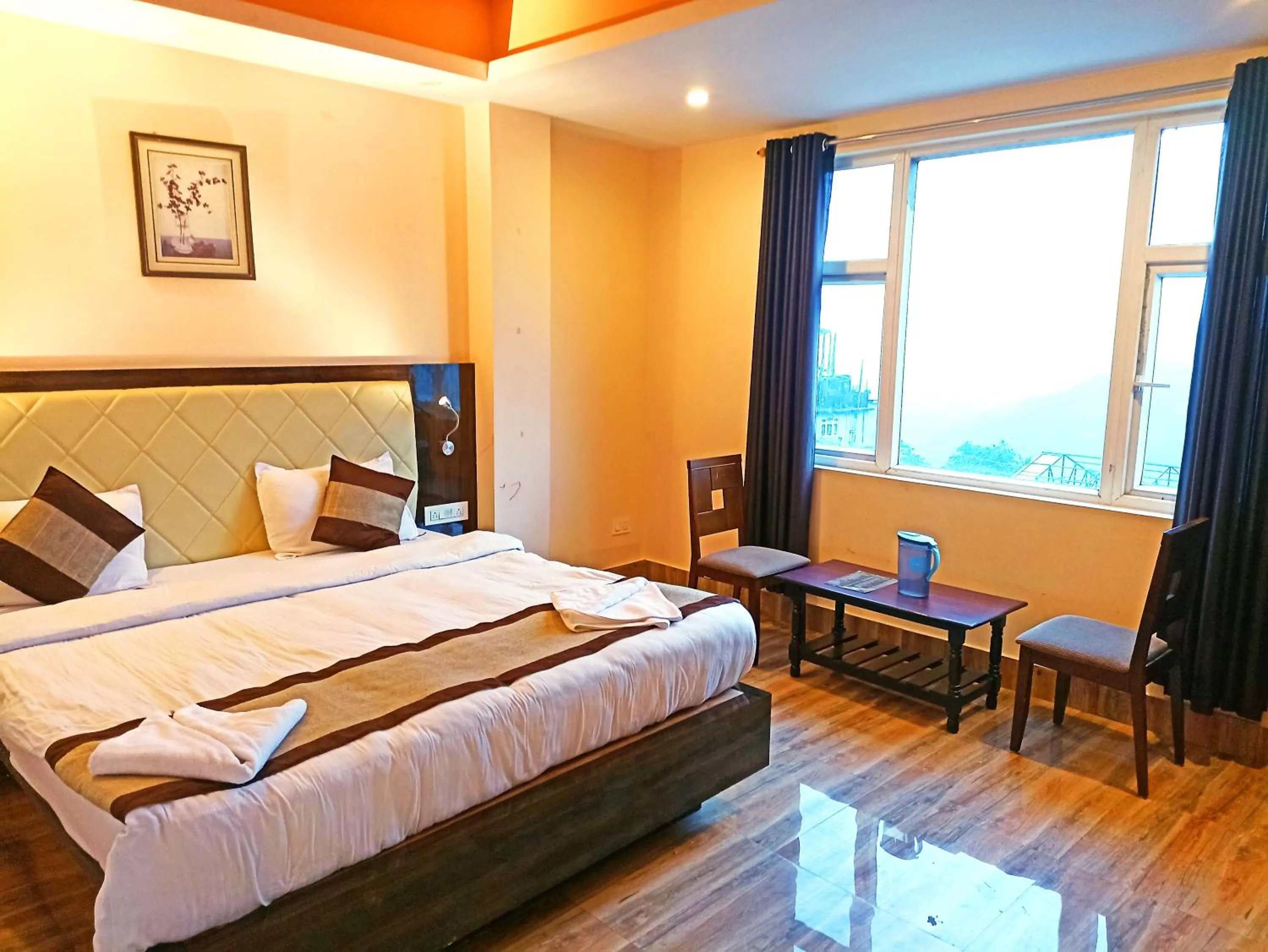 Photo of the whole room, Bed in Garden Retreat Hotel