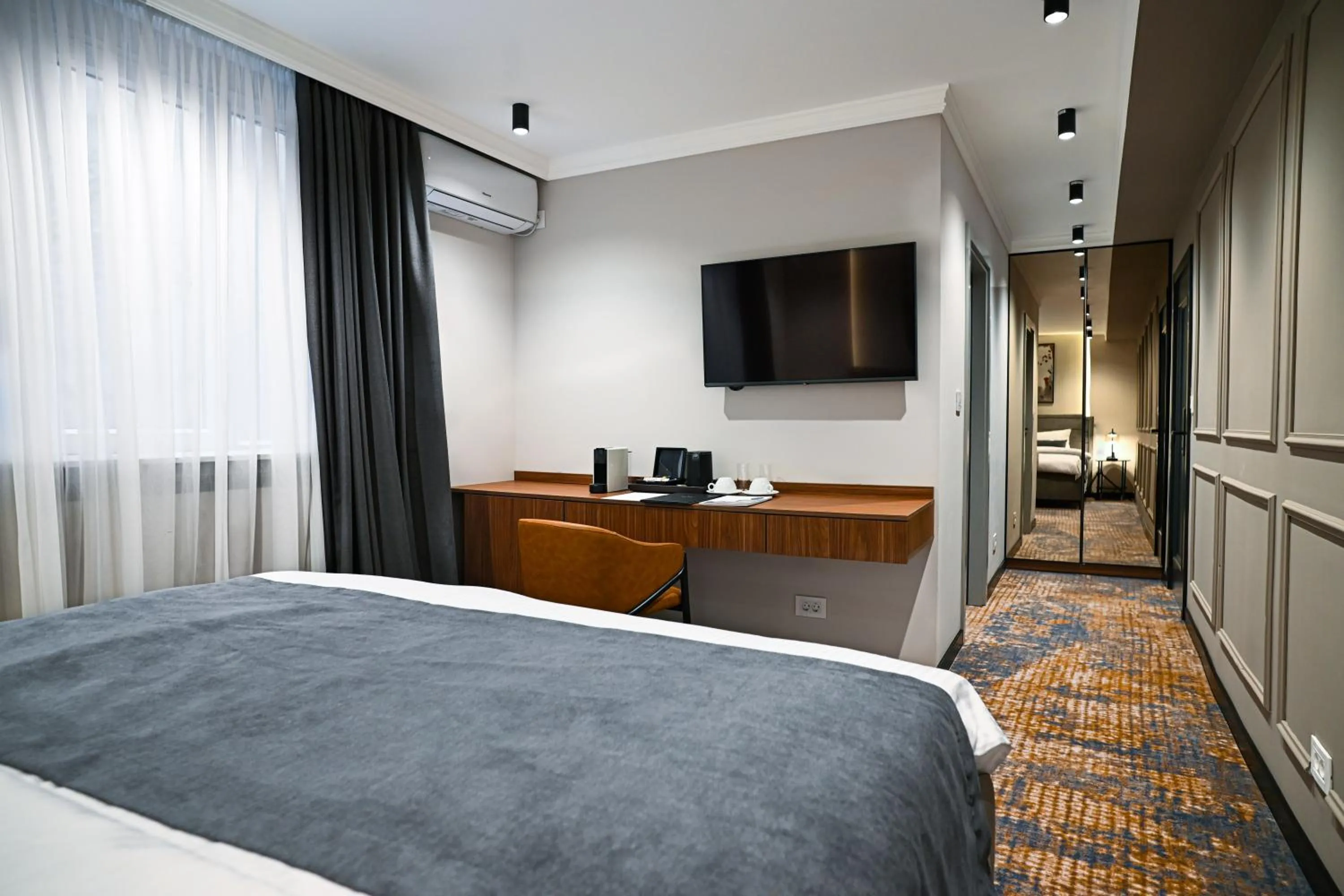 Bed in Black Gallo Residences