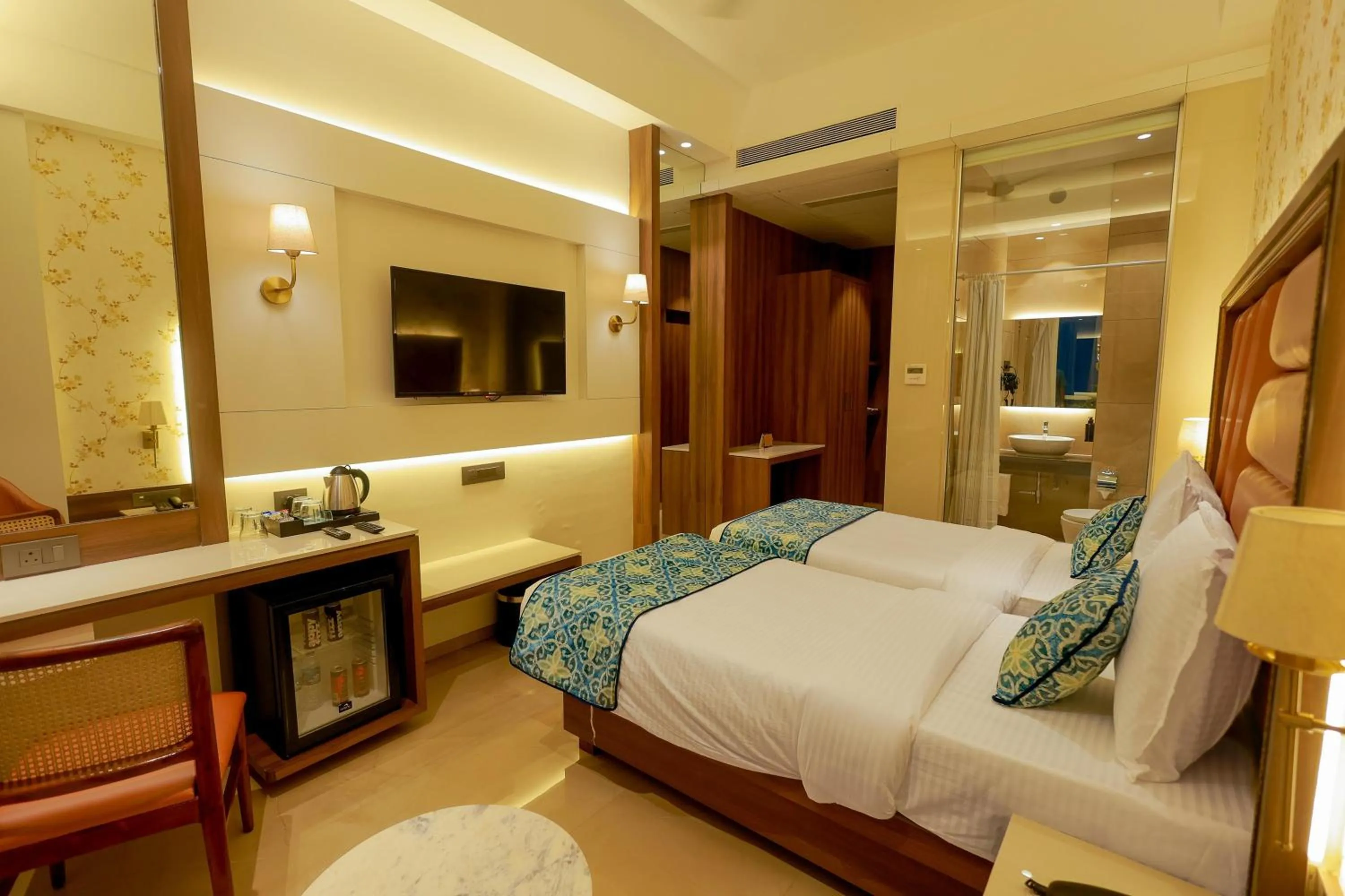 Bed in Shera Hotels & Banquets